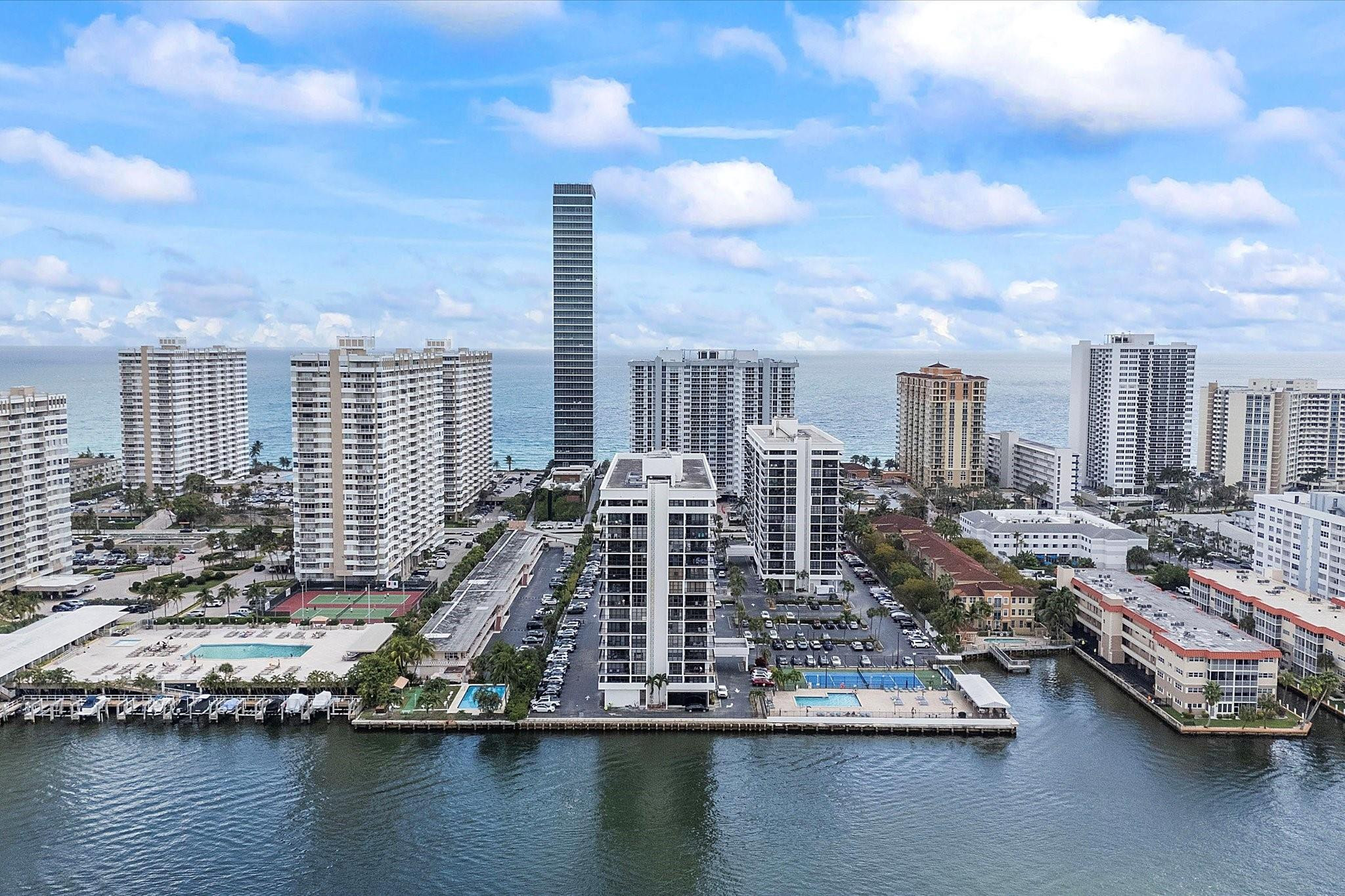 "Wake up steps from the ocean" Make you own!  "Affordable beach living in South Florida" "Seller ready" "Best-priced corner unit in the Opportunity to Live on the Beach!  This bright corner condo offers 1,360 sq. ft. of sun-filled living with 2 bedrooms and 2 bathrooms, designed for comfort and style. Enjoy a wraparound balcony and floor-to-ceiling windows, perfect for sipping your morning coffee with ocean breezes or relaxing with stunning sunset views. Building Features: • Recently recertified building • Strong financials • NO special assessments Maintenance: $830/month and includes cable, internet, water, pest control, and reserves.  Resort-Style Amenities Include: • Heated pool • Tennis courts • Fitness center • 24/7 security