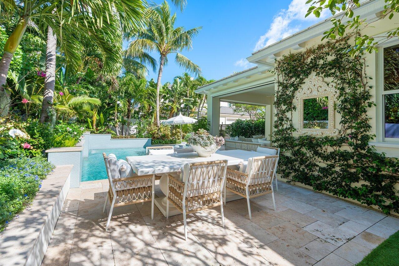 Live the Dream in this superb private enclave of only 5 luxury townhomes in Gulf Stream with private deeded beach access. Integrating the most progressive design with exceptional high quality and the finest of materials, the home was recently renovated by designer Jan Showers. Featured in Kips Bay Decorators Show Houses, the townhouse is truly a one-of-a-kind jewel that redefines the South Florida experience. Boasting 3,521 square feet of thoughtfully designed living space, this stunning home offers 3 spacious bedrooms and 3.1 beautifully appointed bathrooms. The open, bright living area effortlessly flows into an expansive loggia, a Zen-like pool, and a spa area, all surrounded by lush tropical landscaping, creating a perfect setting for relaxation and entertaining. The cutting-edge kitchen is a chef's dream, with custom-designed cabinetry, a large island featuring exquisite Calcutta marble surfaces, and top-of-the-line appliances. The perfect retreat to unwind, the home's ground floor primary suite exudes warmth and comfort, with two generous walk-in closets and a luxurious, spa-inspired bathroom complete with a soaking tub. Upstairs, two large guest suites and a loft area offer privacy and space for guests or family. With bespoke millwork
and extraordinary architectural details throughout, this home exudes sophistication and elegance at every turn. Additionally, the townhouse provides access to all the exclusive amenities of the prestigious 4001 N Ocean, This home is truly a one-of-a-kind gem, offering an unparalleled lifestyle and location the ultimate place to call home for those seeking resort-style living just minutes from the beach and Famed Atlantic Avenue, Delray Beach. See documents for feature list.
