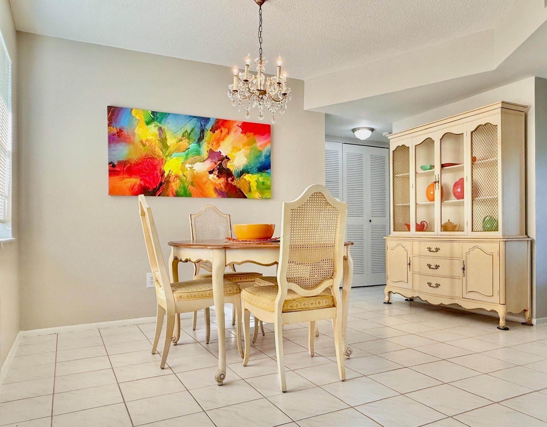 * The Seller will Credit 2 Months of CONDO FEES to the buyer at Closing to help with Moving Costs! *  This 2-Bedroom, 2-Bathroom Condo has been Extremely Well Maintained. Parking Spot Conveniently Out Front. Many Updates Make This Unit an Easy Choice! Newer AC & Tankless Water Heater! Clean, Freshly Painted & Ready for a New Owner. Large, Spread-out Floorplan with Split Bedrooms. Large Living Room, a Formal Dining Room along with an Eat-in Kitchen. Large Screened-in Porch + Open Patio. Primary Suite has Brand New Vinyl Plank Flooring, a Huge Walk-in Closet & Bathroom. Lots of Storage. Great 55+ Community with a Large Clubhouse including a Fitness Room, Billiards, Function Room, Kitchen and a Heated Pool, Tennis, Shuffleboard & BBQ Area. Condo Fee includes Cable TV & Interior Pest Control.