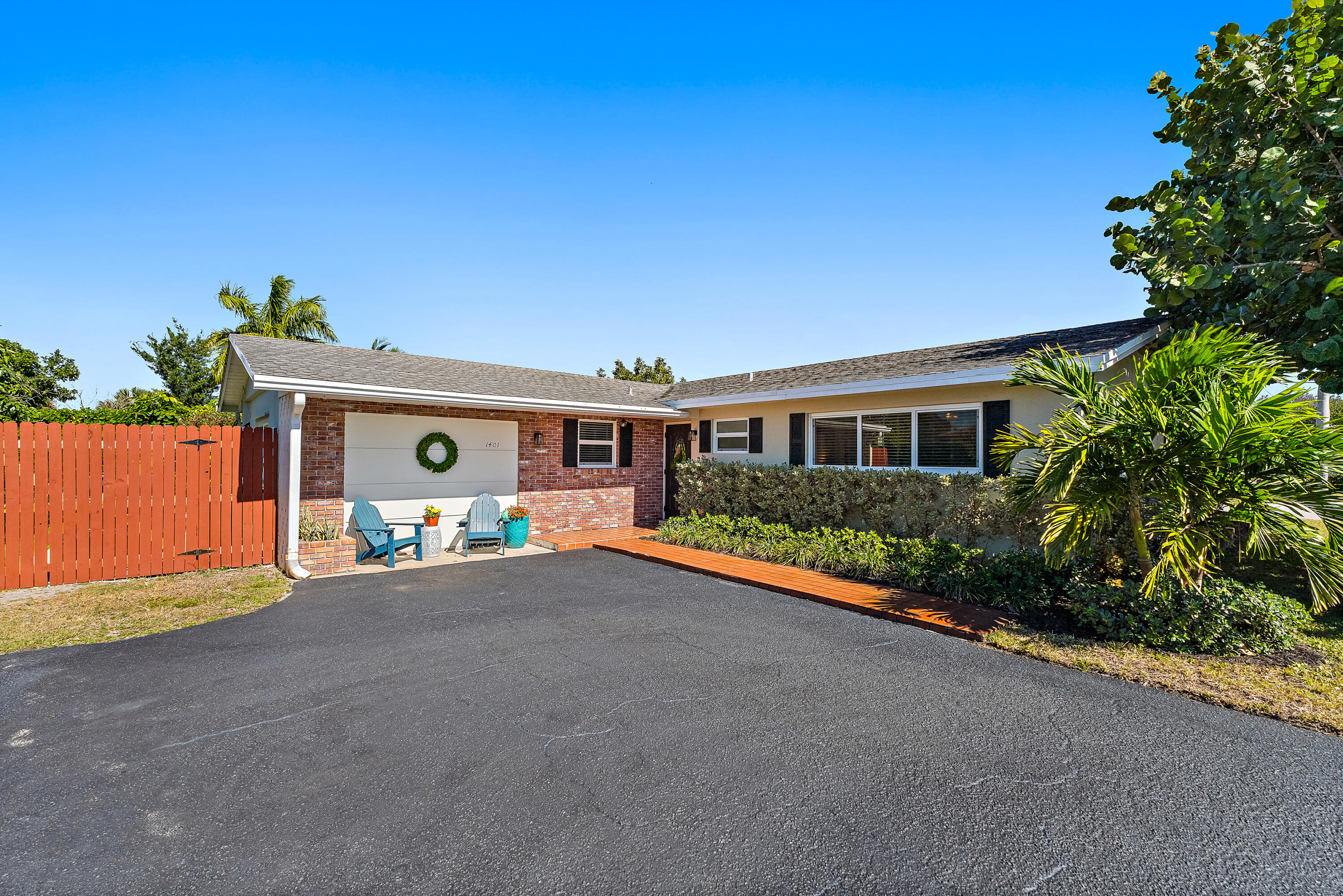 Positioned on an oversized corner lot in Lake Clarke Shores, this updated CBS 3-bedroom, 2-bathroom home offers a seamless blend of modern style and comfort. The 2022 renovation features a contemporary kitchen with stainless steel appliances, sleek cabinetry, and tasteful finishes, along with two fully updated bathrooms.
The open-concept layout is highlighted by luxury vinyl plank flooring and exceptional natural light throughout. Just off the kitchen, a flexible bonus room serves perfectly as a home office, gym, playroom, or guest space. Toward the back of the home, a bright Florida room with expansive windows offers additional living space ideal for relaxing, entertaining, or enjoying the afternoon sun.
Recent improvements include full impact windows installed in 2023 and 2024, a newer A/C system (2016/2017), updated electrical panel (2022), and a new irrigation pump (2024) for the fully functioning sprinkler system.
The spacious backyard provides privacy and room to personalize. Located in a golf cart-friendly community near parks, tennis courts, and local dining, this move-in-ready home delivers updated finishes, flexible spaces, and the freedom of no HOA.