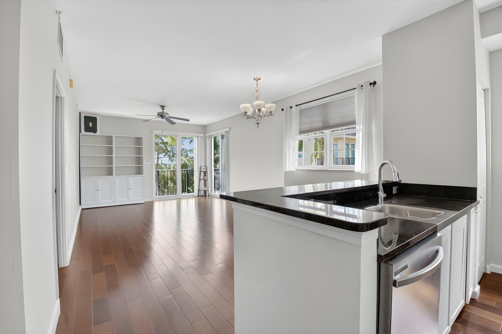 Rare opportunity to lease this bright and spacious 1 bedroom, 1 bath corner residence just one block from coveted Atlantic Avenue in the heart of Downtown Delray Beach with cable and internet included. This well-appointed condo features wood flooring throughout, granite countertops, stainless steel appliances, abundant natural light, and the convenience of an in-unit washer and dryer. Residents of The Astor enjoy secured garage parking, ample guest parking, and a stunning rooftop pool with expansive views. Enjoy the ultimate downtown lifestyle with restaurants, shopping, nightlife, and the beach just moments away. Available July 2026. Schedule your private showing today.