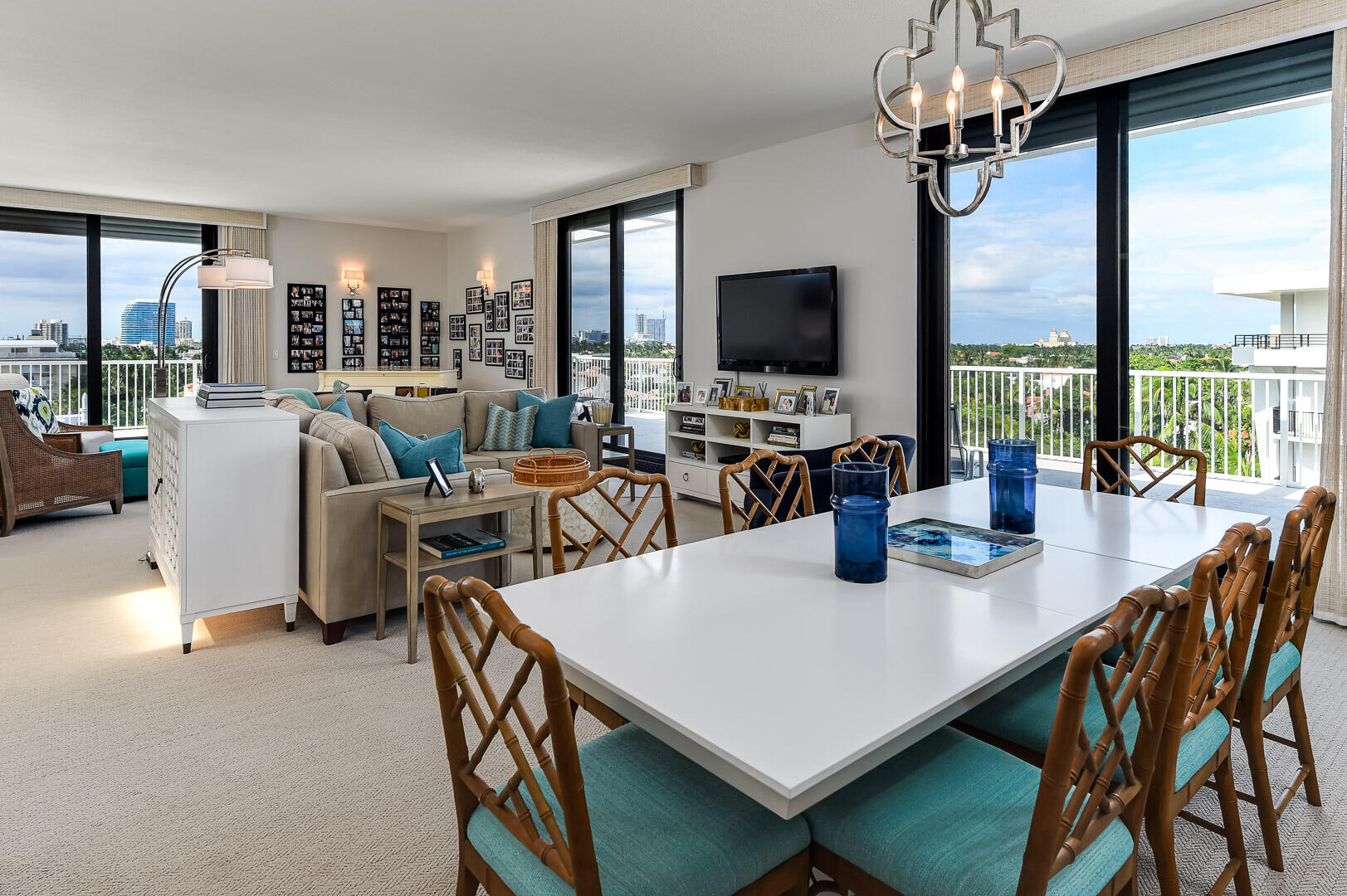 Magnificent light-filled corner penthouse with over 3,300 sf of living space inside and out, with breathtaking ocean and city skyline views.   Floor to ceiling sliders allow access to the terrace from the living room/dining room, and from both bedrooms.  The elegant floor plan features a skylighted entrance foyer, a grand 38 foot living room/dining room, two spacious bedrooms and two baths. Volume rooms with 10 foot ceilings throughout.  The 400 Building designed by renowned architect Edward Durell Stone features a magnificent atrium water garden.  The penthouse level pool with sundeck, function room and exercise room all with stunning ocean views.   The building offers 6 guest bedrooms for residents and their guests.  Across the street from Mid-Town Beach, and a block from Worth Avenue.  A pet friendly building.