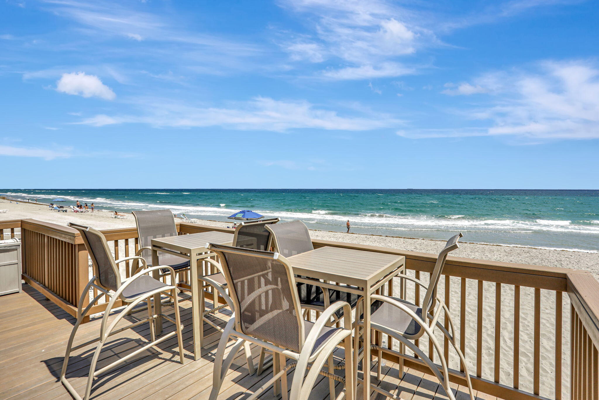 Introducing a Rare, One-of-a-Kind, SE Corner 2/2 Residence Offering Unobstructed, Panoramic Atlantic Ocean Views—an Exclusive Opportunity for the Discerning Luxury Buyer-Open & Light-Filled Layout from an Expansive, Wraparound Patio Creates Seamless Indoor-Outdoor Flow-This Fully Reimagined Coastal Retreat Delivers a Chef-Inspired Kitchen, Wood Cabinetry, Striking Quartzite Counters, Oversized Island, Premium Stainless Appliances, Built-in Microwave, Warming Drawer, Instant Hot Water, Wine Cooler & Custom Pantry-Curated with High-End Finishes & Modern Enhancements throughout including a New HVAC for Efficiency, Impact Glass, Electric Shades, New Plumbing & Electrical, Soundproofed Primary Suite, Porcelain Flooring, Designer Paint, Reflective Raised Ceiling, Water Filtration & in-unit W/D- Enjoy Added Value with Cable, Internet, & Water Included. This Condo has Unmatched Security, Convenience & Community Living. It has a Manned Guard & Locked Entries for Security, and an Under-Carport Parking Space which allows Easy Access to your Home for Groceries. This is a Vibrant Social Condominium where you can Enjoy BBQ's, Holiday Gatherings & a Warm Welcoming Atmosphere. You have Direct Beach Access from Opal Towers Deck Area which has a Heated Pool, Convenient Showers with Warm Water, Multiple BBQ Grills with Gas, and Picnic Seating for Hosting Parties. This Community has Something for Everyone whether Working out in the State of the Art Fitness Center, Playing a Game of 8 Ball in the Game Room, Meeting Friends for a Glass of Wine or Mahjong in the Community Room, Reclining on Opal Tower's Beach Chairs or Stepping Outside to Feel the Sand Between your Toes. This Spectacular Oceanfront Retreat is Truly Move-in Ready, Whether Looking for a Full-Time Residence or a Beachfront Getaway, don't Miss this Opportunity to Own this Exclusive Beachfront Dream! Close to Shopping, Restaurants, and Deerfield Beach Pier! A Truly Exceptional, Move-in-Ready Residence Where Luxury Meets the Tranquility of Oceanfront Living. Furniture Negotiable! Schedule your Private Showing Today!