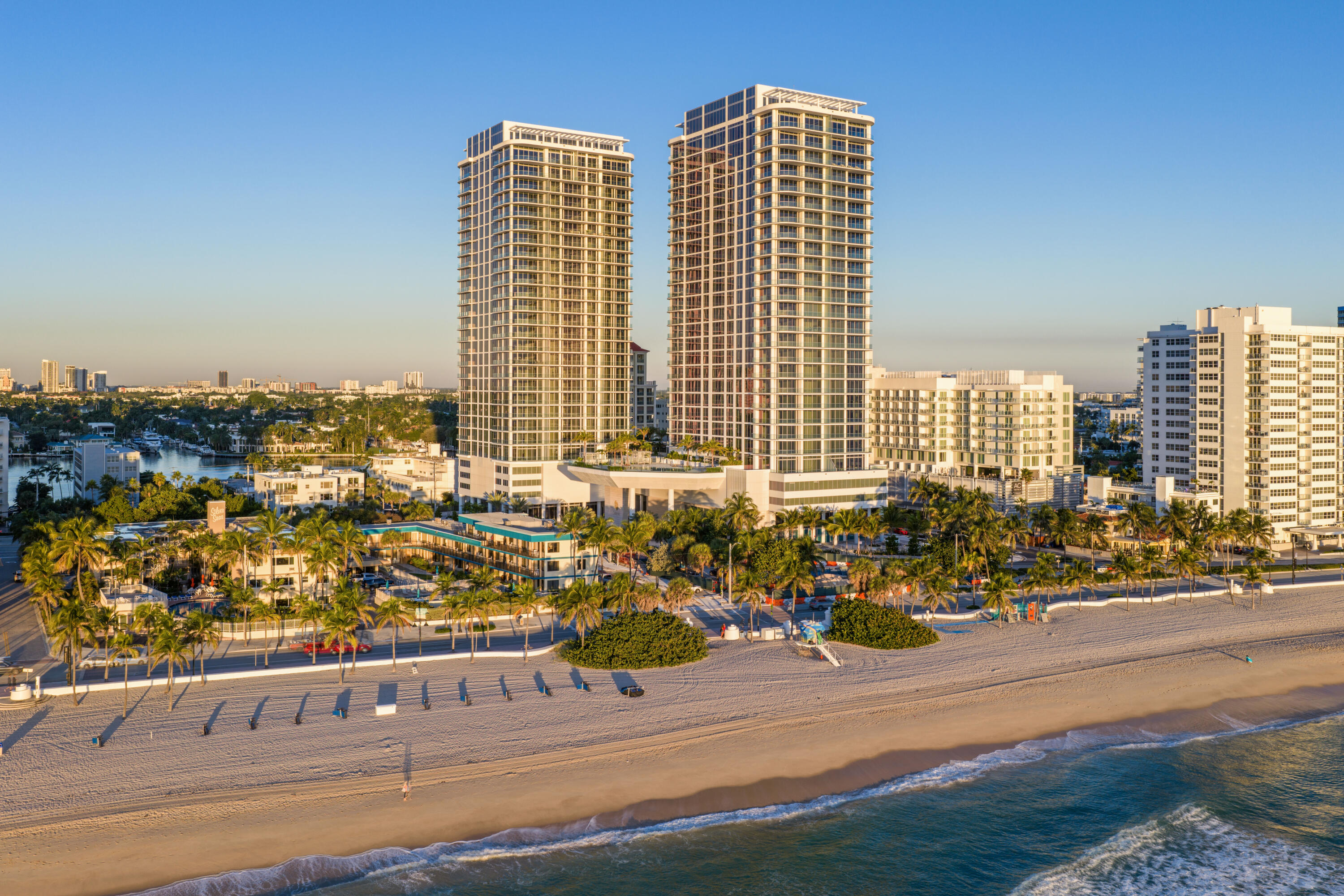 Now is your opportunity to own the epitome of luxury at Fort Lauderdale Beach's newest completed development Selene Oceanfront Residences. Perfectly situated, this Beachwalk model features impressive intracoastal, ocean and downtown Fort Lauderdale views. An oversized great room entirely of glass is anchored by the chef's kitchen with custom modern white front and black interior cabinetry, quartz slab backsplash and Wolf and Subzero appliance package. Stepping outside is the ultimate outdoor entertaining space with over 350 square feet of wrap around balcony. TWO LARGE BEDROOMS AND A CLOSED OFF DEN, each with their own ensuite bath, provide versatile living spaces. 5 Star Amenities include two pools, fitness center, media theater, valet and concierge.