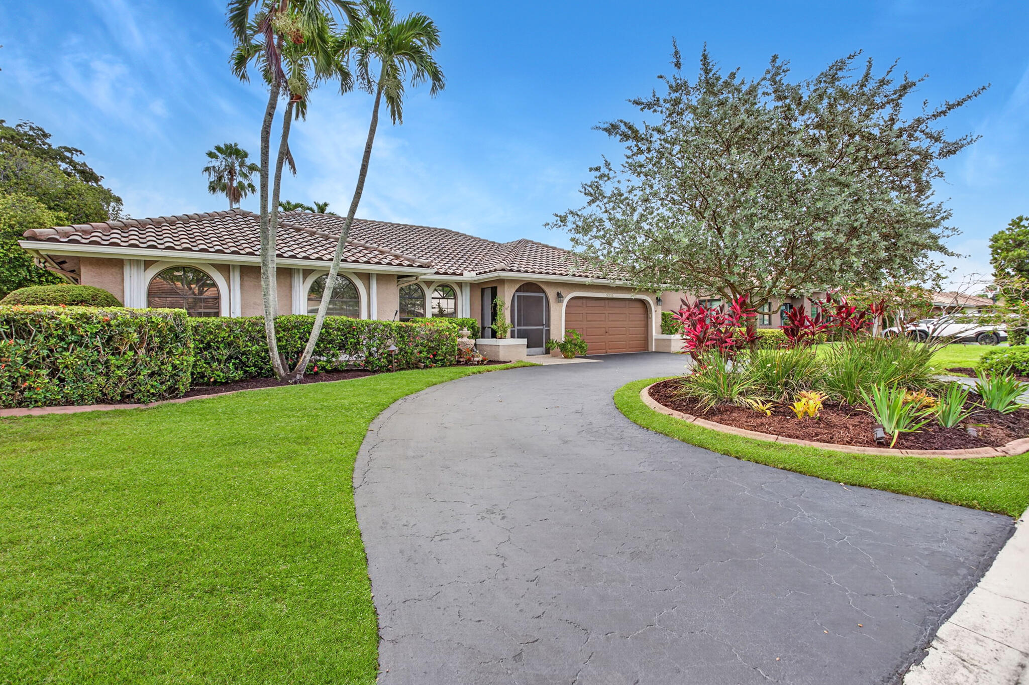 Welcome to Hidden Hammocks, one of Coral Springs' most beloved communities, known for its canopy of mature trees, two scenic parks, resident fishing lakes, and walkable access to A-rated Park Springs Elementary. Tucked away on a quiet dead-end street, this beautifully updated 4-bedroom, 2-bath home offers nearly 2,300 sq ft of open living space. The stunning kitchen features rich wood cabinetry, granite countertops, and flows seamlessly into the main living areas—perfect for entertaining. Enjoy peace of mind with full hurricane protection, a newer roof (2016), newer A/C, and updated bathrooms. Step outside to your private backyard retreat complete with a sparkling pool and brand-new heater (2026). All with an incredibly low HOA of just $43.33 per month.