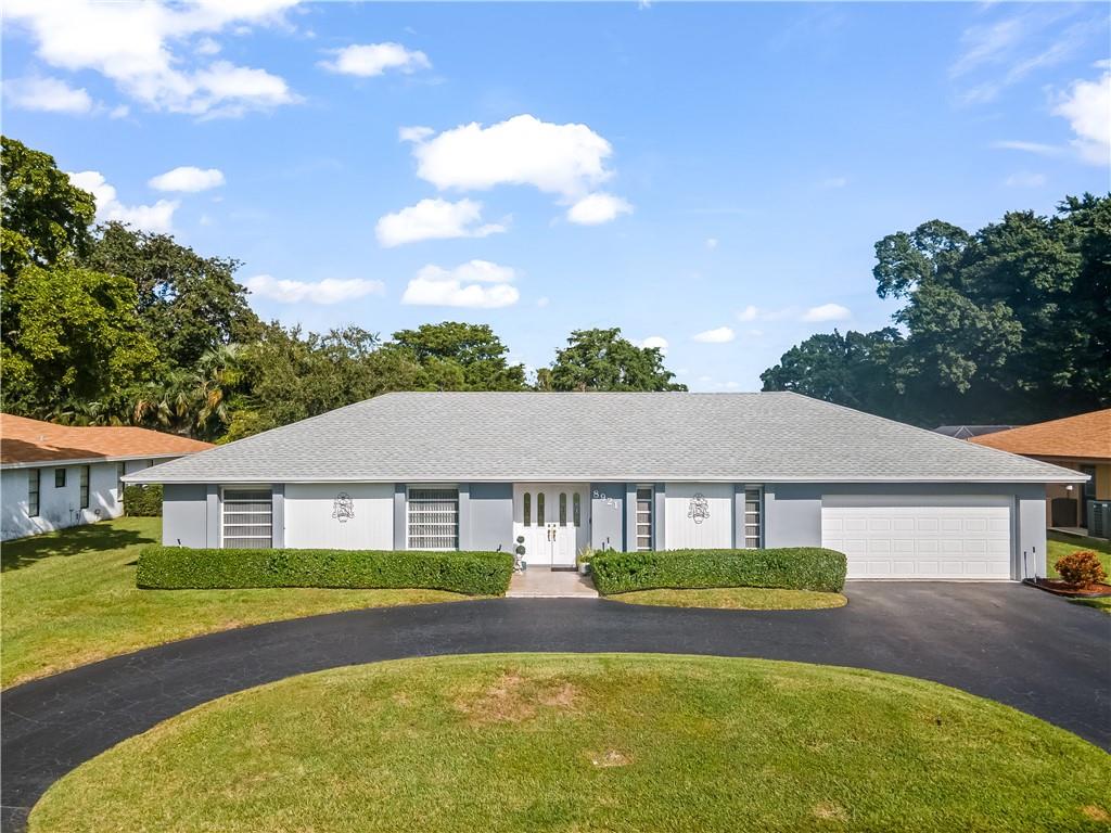 Enjoy unobstructed Golf Course Views in the heart of Jacaranda Country Club! This fabulous 4 bedroom, 3 full bath home offers the best of South Florida Living. Start your morning sipping coffee and looking out over the 14th hole of the East Course. End your day entertaining on the large screened patio and pool. Scenic views from all living areas and a huge open kitchen and family area, perfect for indoor/outdoor living. Primary suite has spacious bath with dressing area, large walk in closet, & additional vanity. Brand new a/c, loads of storage & closets, separate laundry room, complete hurricane protection, additional backyard lawn space and so much more. Truly a must see! Ideal location with a low yearly hoa and close to shopping, restaurants and all major roads.