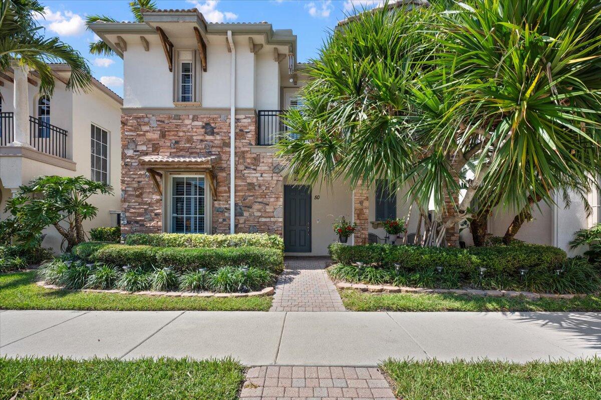 Light & Bright with Lots of Space. Rarely Available 3Bed/3.5Bath With 2 Owner's Suites (Downstairs & Upstairs). Open Kitchen has Top Notch Appliances, Quartz Countertops, Tumbled Marble Backsplash, Shelved Storage Pantry & Tons of Cabinet Space. Separate Living Room has Double Wide Sliding Glass Doors That Lead to an Enclosed Courtyard Patio with a Retractable Awning. Separate Dining Area. ½ Bath is Conveniently Located off the Dining & Living Rooms. Upstairs & Downstairs Owner's Suites have Shelved Closets + Ensuite Bathrooms. Spacious Upstairs 2nd Bedroom has a Private Bathroom. Accordion Hurricane Protection. Enjoy All the Resort-Like Amenities that Evergrene has to Offer, Zoned within All the Triple "A" Rated Schools, Minutes from the Airport, Beach, Downtown Shops & Restaurants.