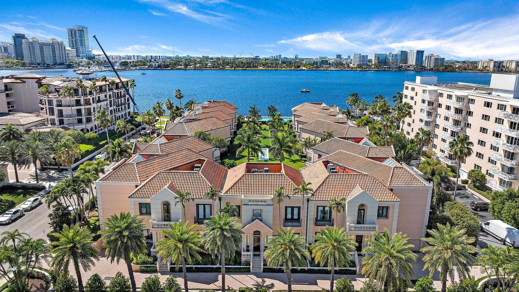 Waterfront jewel box sublimely located on the Intracoastal Waterway, this beautiful 3 BR, 4.1 bath townhome with den is move in ready.  Styled for Palm Beach living, this 3-story townhome has 12' ceilings, garage parking for 3 cars, a primary suite with dual baths, and a lovely garden patio looking out to the Intracoastal.  Amenities include a lakeside pool and tennis court.  Near shopping, restaurants, ocean beaches, and the Lake Trail.