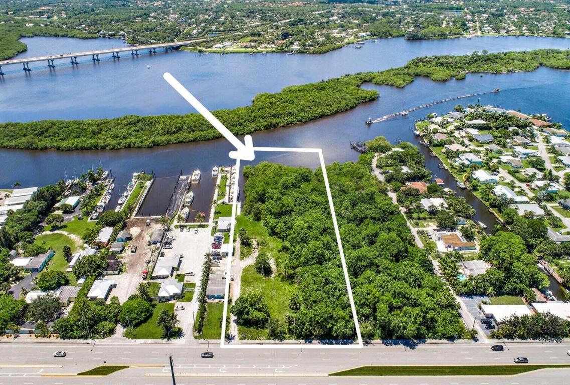 An EXCEPTIONAL commercial opportunity in one of Stuart's fastest-growing corridors. This 2.6-ACRE WATERFRONT parcel on Kanner Highway offers incredible flexibility with Martin County zoning and approved, permitted plans for 9 boat slips and a dock already in place.  Extensive due diligence has been completed, including environmental studies, soil testing, and additional reports, all of which are available upon request, making this a truly shovel-ready opportunity for a variety of development paths. Permitted uses allow for multifamily residential (up to 17 townhomes, for example), dry boat storage, retail, and other commercial uses, full details available in the documents tab.  Located in a rapidly transforming section of Stuart, this property sits directly along Kanner Highway, an an area seeing significant investment and growth. Costco is just across the street, with new townhome communities, apartment developments, and a nearby shopping plaza already underway, further solidifying this location as a prime destination for future development.  With waterfront access, strong zoning flexibility, completed due diligence, and positioning in an up-and-coming commercial hub, this property presents a rare opportunity to capitalize on the momentum of one of Stuart's most promising growth areas.