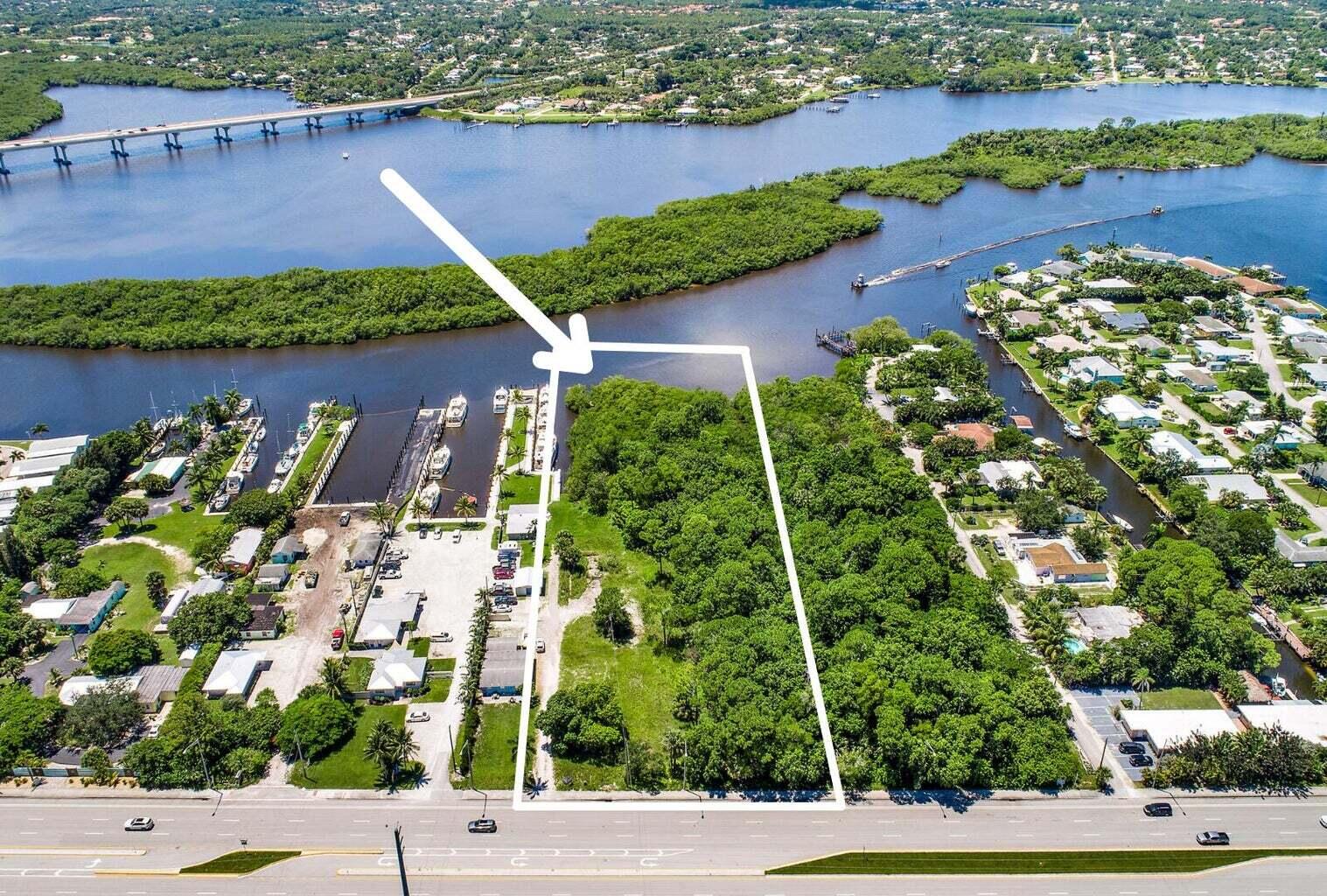 An EXCEPTIONAL commercial opportunity in one of Stuart's fastest-growing corridors. This 2.6-ACRE WATERFRONT parcel on Kanner Highway offers incredible flexibility with Martin County zoning and approved, permitted plans for 9 boat slips and a dock already in place.  Extensive due diligence has been completed, including environmental studies, soil testing, and additional reports, all of which are available upon request, making this a truly shovel-ready opportunity for a variety of development paths. Permitted uses allow for multifamily residential (up to 17 townhomes, for example), dry boat storage, retail, and other commercial uses, full details available in the documents tab.  Located in a rapidly transforming section of Stuart, this property sits directly along Kanner Highway, an an area seeing significant investment and growth. Costco is just across the street, with new townhome communities, apartment developments, and a nearby shopping plaza already underway, further solidifying this location as a prime destination for future development.  With waterfront access, strong zoning flexibility, completed due diligence, and positioning in an up-and-coming commercial hub, this property presents a rare opportunity to capitalize on the momentum of one of Stuart's most promising growth areas.