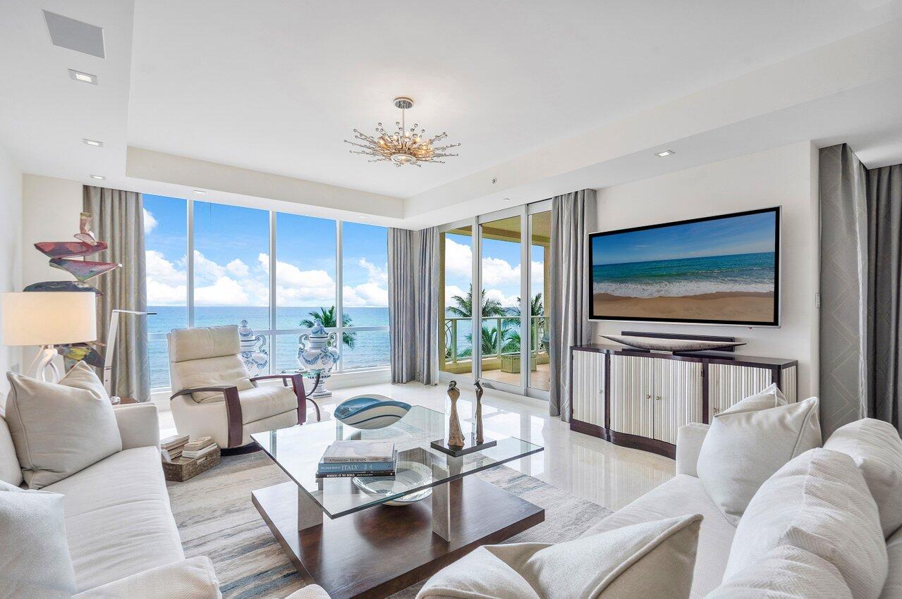 Exceptional oceanfront living, 4001 North Ocean, is a private enclave of only 33 intimately scaled residences in the exclusive town of Gulf Stream. Designed with a classic modern flair by noted architect Randal Stofft and situated on a rare 300 feet of direct oceanfront, this 3520 TSF 3 Bedroom 3.1 Bath residence offers a lifestyle of carefree luxury. Fresh and clean in design, this residence features floor-to-ceiling windows providing an abundance of natural light illuminating the spacious interior and offering unrivaled panoramic views of the ocean creating a tranquil and warm atmosphere. With impeccable modern details that set a new standard for luxury living, the grand salon and dining area boast soaring ceilings, seamless access to a large 483 sqft balcony, and a wet bar all with ocean views. A gourmet kitchen with abundant custom-fitted cabinets, beautiful marble surfaces, and a large walk-in pantry has all that one expects of a home of this caliber, affording family and guests ample opportunity to entertain or have a quiet respite. Marble throughout, along with extensive millwork and a chic palette of natural hues, enhance the ambiance, creating a space that is both sophisticated and inviting. Wake up to magnificent ocean sunrises from your primary suite, featuring floor-to-ceiling doors with balcony access, and a luxurious master bath created with the finest materials blending fine craftsmanship and elegance. Providing an atmosphere of style and comfort are two perfectly appointed guest suites for friends or family, Additionally, there are two indoor parking spaces, bike and surfboard storage, and an extra private storage room, The amenities are equally elevated; Residents enjoy access to an oceanfront fitness center a spectacular pool deck with hot tub, ocean side grill, beach set up and gold star concierge service. Indeed 4001 North Ocean is exceptional throughout and epitomizes "Life Well-Lived". Ready for you to enjoy magnificent sunrises and shimmering ocean views. Moments to fine dining and boutique shopping along famed Atlantic Ave and Worth Ave. in Palm Beach.