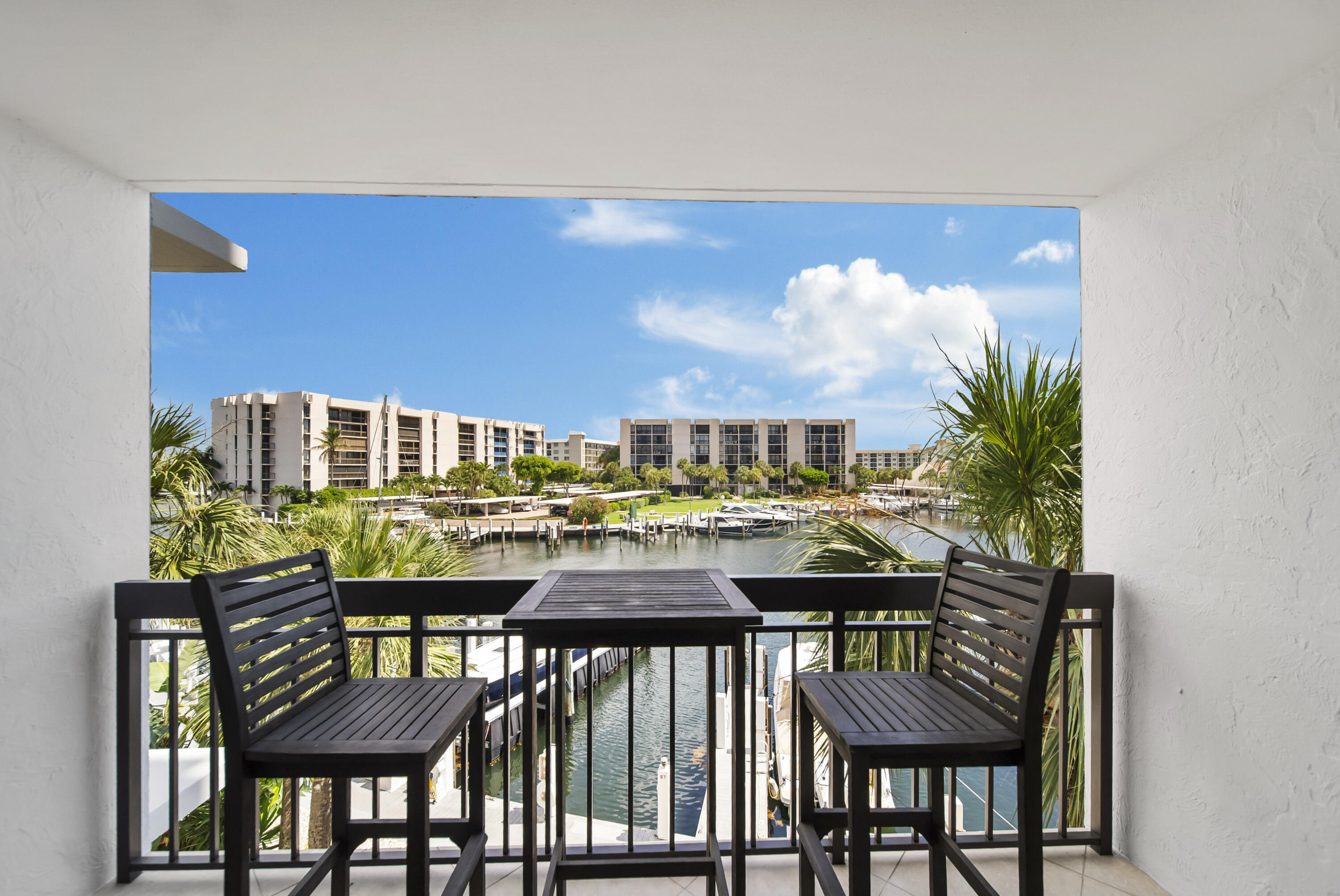 Lowest priced unit in Y&R. Great opportunity to buy and make it your own style. 2BR/2BA overlookning the marina. Concrete Restoration will be completed on this building in July 2026. All assessments paid. Best Resort style community on the beach. Brand new clubhouse with fitness center, club rooms, exercise classes,tennis & pickleball courts, 3 heated pools, deep water marina, 750 ft of private beach and a waterfront restaurant serving B/L/D six days/week. It's a vacation spot like no other! Come join the fun!