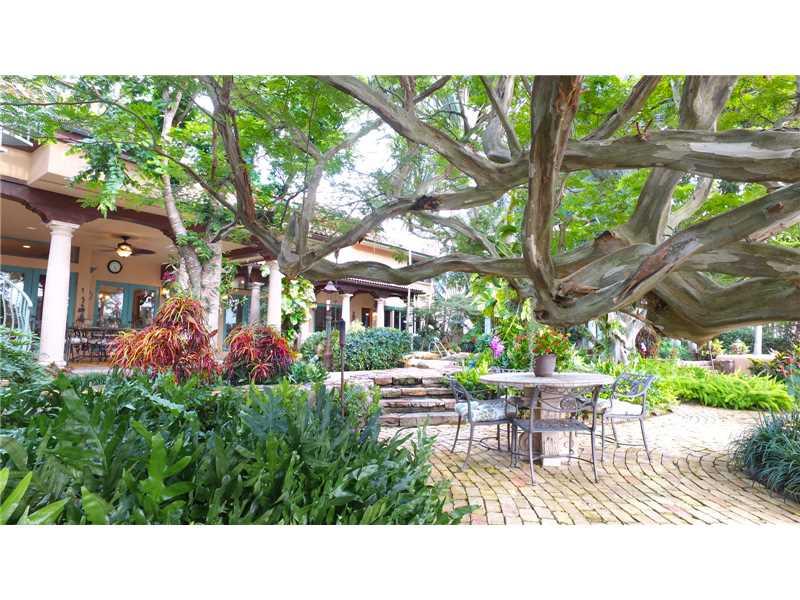 Sweeping views of the both the Intracoastal and mouth of the Middle River.  Mediterranean in style, richly landscaped lot with walkways leading to private sitting areas, terraces and covered porches all surrounding a tropical, heated lagoon.  Upstairs mas ter suite with library, separated from the rest of the home by an open span walkway overlooking the living room.  Formal dining area, living room with fireplace, family room, gourmet, eat-in kitchen. Please view the virtual tour to begin to understand.