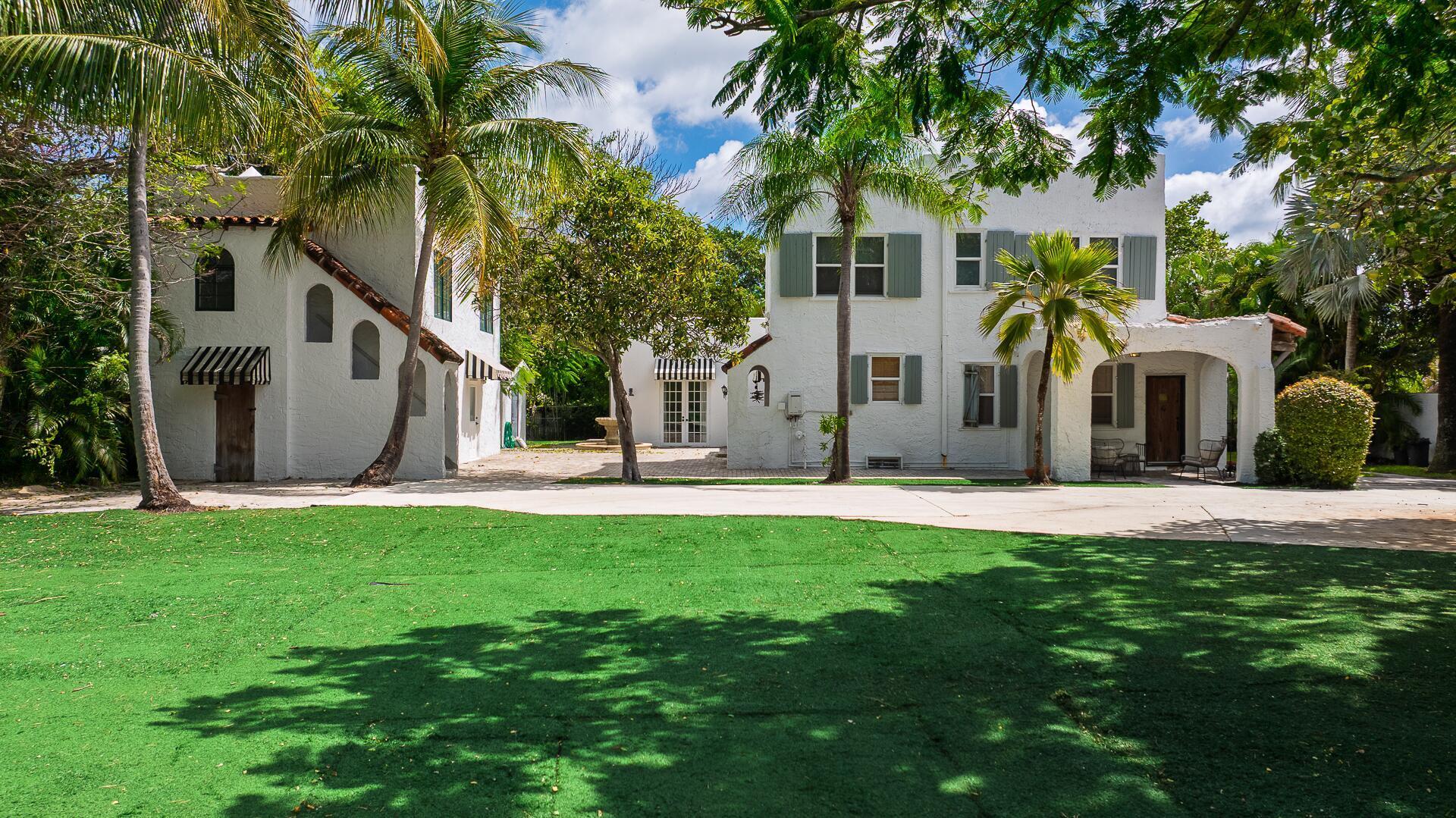 Welcome to this gorgeous 1920s Spanish Compound in the Heart of West Palm Beach. Step into a piece of timeless Palm Beach history — a stunning Spanish-style estate celebrating its 100th year. Once owned by the best friend of Lilly Pulitzer, this one-of-a-kind property captures the essence of Old Florida charm with a touch of bohemian luxury. This 4 unit multi-family property is set on a lush ½-acre in one of West Palm Beach's most desirable neighborhoods. The thoughtfully restored compound features a 4-bedroom main house, a spacious 1,200 sq/ft studio with vaulted ceilings, and two private apartments — offering flexibility for guests, staff, or extended family. Every corner of this estate has been curated with care, blending original architectural details with elegant modern updates. Special Events, Corporate Retreats, and 6 Weddings/yr are permissible. Perspective buyer to verify with City and County for rules and regulations.   The grounds are a tropical paradise, stroll through the orchid garden, gather by the fountain, or host unforgettable dinners and celebrations in the courtyard under twinkling bistro lights. Perfect for seasonal stays, family gatherings, or business retreats, This is more than a property   it's an experience. Enjoy the vibrant lifestyle of West Palm Beach, with the city's best shopping, dining, and cultural attractions just a short walk away.  Historic. Elegant. Unrivaled. Come discover the magic of this property where heritage, artistry, and elegance meet.    DISCLAIMER: All information provided to you regarding this Property by listing agent has been obtained from third parties such as the Multiple Listing Service, public records and other sources. All Buyers should independently verify all information provided regarding this Property. The Seller, listing agent and broker make no representation as to the accuracy of this information.