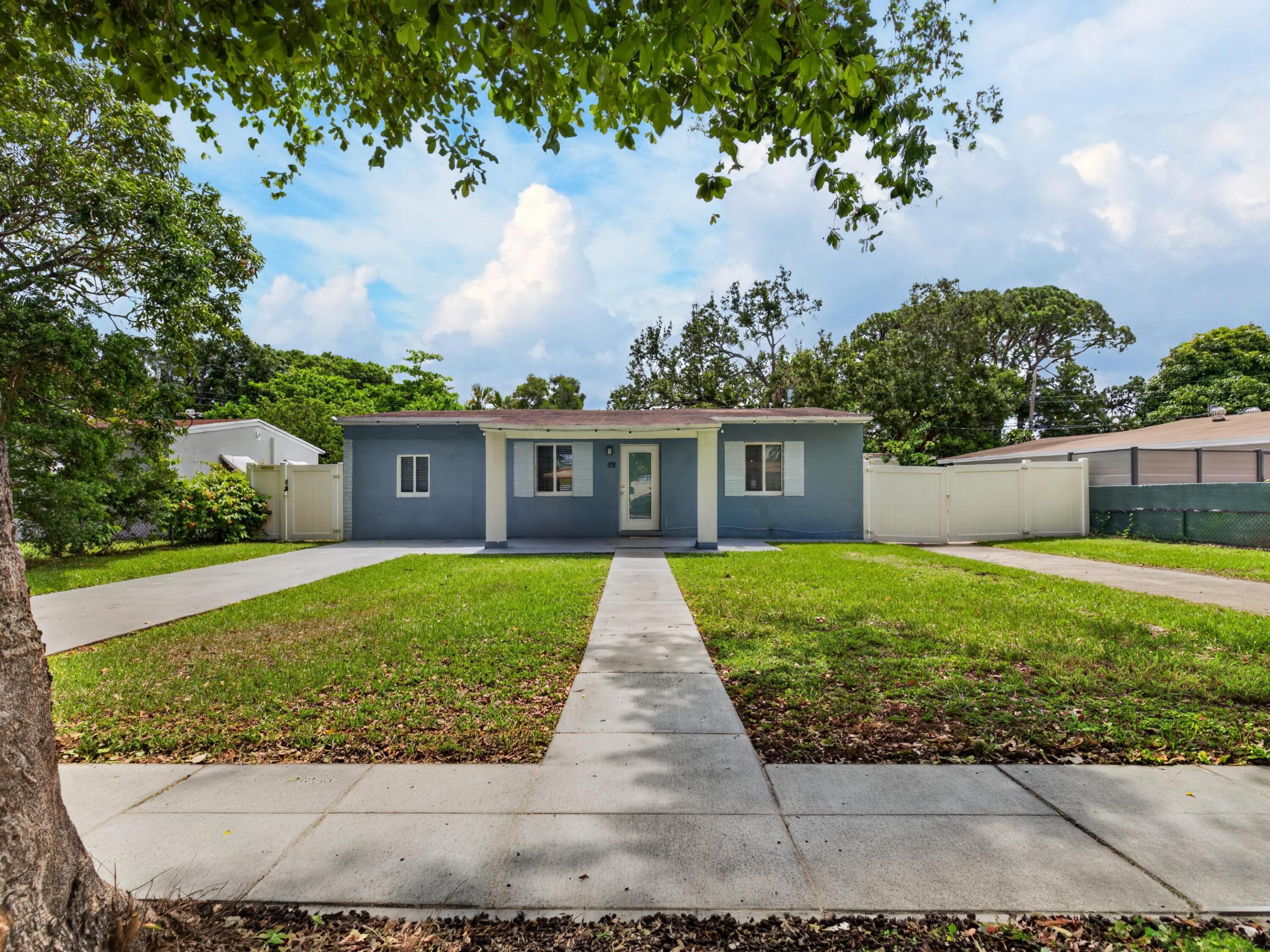 Charming and beautifully updated 3-bedroom, 2-bath residence offering 1,069 square feet of thoughtfully designed living space in a prime Fort Lauderdale location. Major improvements completed in 2018/2019 include updated electrical and plumbing systems for added peace of mind. Impact windows and sliding glass doors fill the home with natural light and open to a private, fenced backyard ideal for entertaining, pets, or relaxing outdoors. The kitchen features stainless steel appliances, including a washer and dryer. Dual driveways provide abundant parking. No HOA. Conveniently located just minutes from Downtown Fort Lauderdale and Wilton Manors, with easy access to major highways, shopping, dining, beaches, and popular retailers.  ALL OFFERS ON AS IS CONTRACT. 5 DAY INSPECTION, CLOSING AGENT BROWARD.