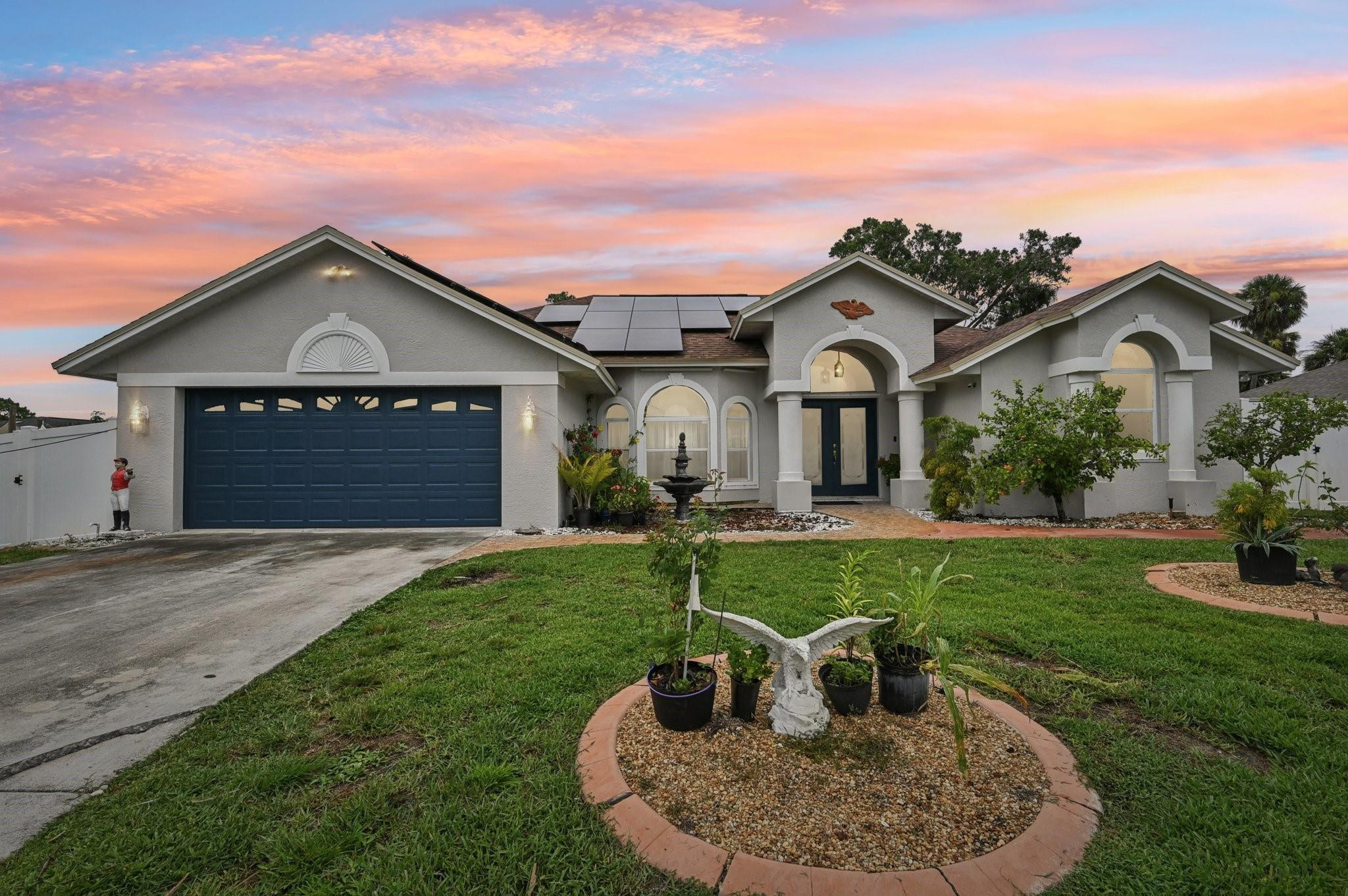 Discover comfort and convenience in this spacious home complete with newer roof and 6' vinyl fence (2023), A/C replaced (2020), and solar panels (2024/2025). Inside find separate dining, living, and family rooms, offering versatile spaces for every need. The converted garage adds even more flexibility. Architectural archways lead to the spacious kitchen, featuring a center island and stainless steel appliances. The split bedroom layout ensures privacy, the primary bedroom offers a large closet and en-suite bathroom. A dedicated laundry room is complete with full-size washer, dryer, and laundry sink. The private pool and screened patio provides the perfect oasis for relaxing or entertaining. Steps away from boat ramp, fishing pier, playground and more. Don't miss out on this one!