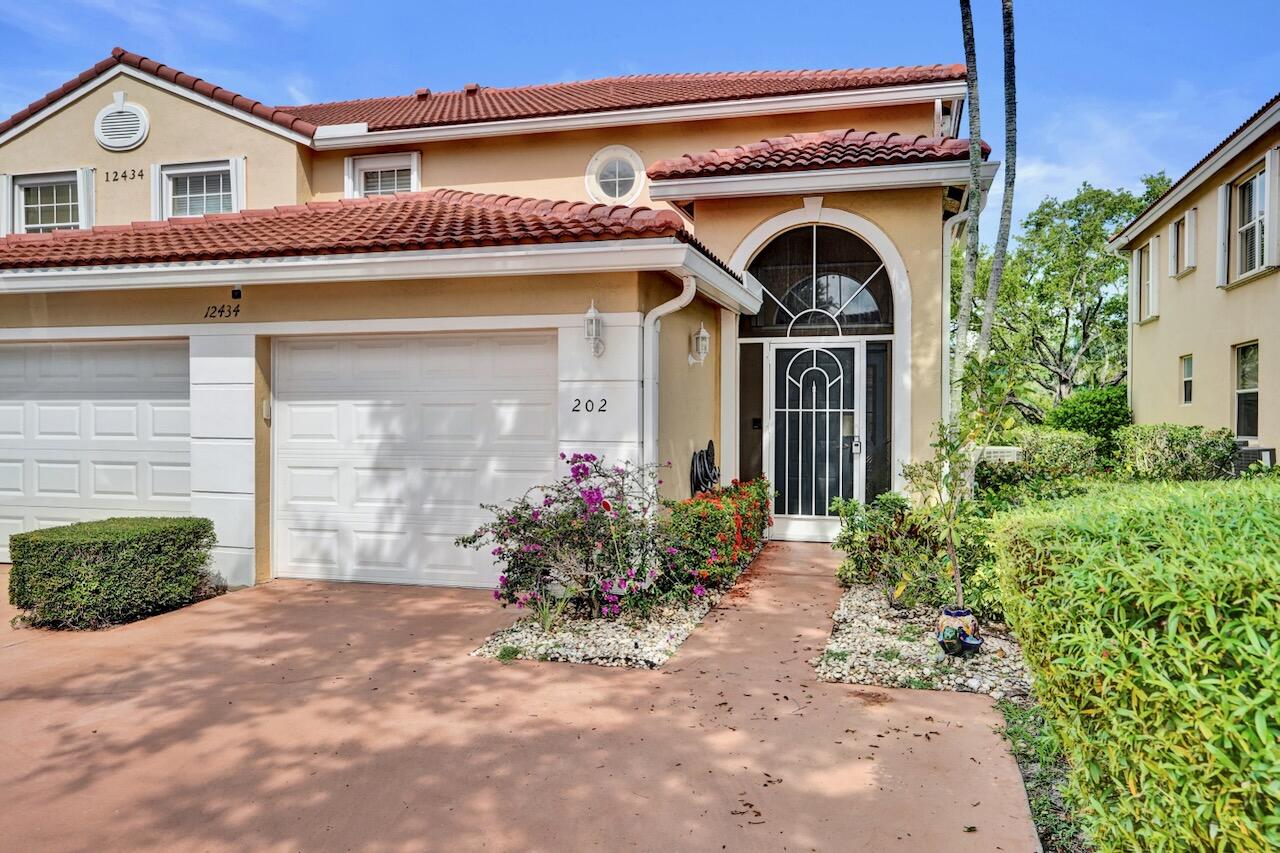 Welcome to this beautifully maintained 3-bedroom, 2-bathroom condo in the highly desirable 55+ community of Coral Lakes. Located on the second floor, this spacious corner residence offers nearly 1,800 square feet of comfortable living space, complete with a private elevator for effortless access, as well as a staircase for added convenience. Designed with both comfort and style in mind, this floor plan is filled with natural light and enhanced by soaring cathedral ceilings. A neutral color palette creates a warm, inviting atmosphere that complements any décor. The expansive living areas flow seamlessly to a private balcony, where you can relax and enjoy peaceful lake views.    Coral Lakes offers an exceptional lifestyle with a newly renovated clubhouse and an impressive array of  resort-style amenities. Residents enjoy a theater, billiard, ballroom, card room, craft room, state-of-the-art fitness center, a heated indoor pool, multiple outdoor pools, tennis and pickleball courts, an on-site café, and a vibrant social calendar filled with activities and events. Beautifully landscaped grounds and a prime location near shopping, dining, and everyday conveniences make this community truly special.  This exceptional property is available furnished or unfurnished, offering flexibility to suit your needs. Property can be rented right away, 181 day minimum and limited to one time per year.  A one time capital contribution of $3500 is due at closing and there are no assessments.  A 2017 water heater, 2019 A/C unit and accordion shutters provide peace of mind.  Don't miss this opportunity to enjoy the best of active adult living in one of the area's most sought-after communities.   INFORMATION HEREIN NOT GUARANTEED AND SUBJECT TO ERRORS & OMISSIONS. ALL MEASUREMENTS APPROXIMATE.