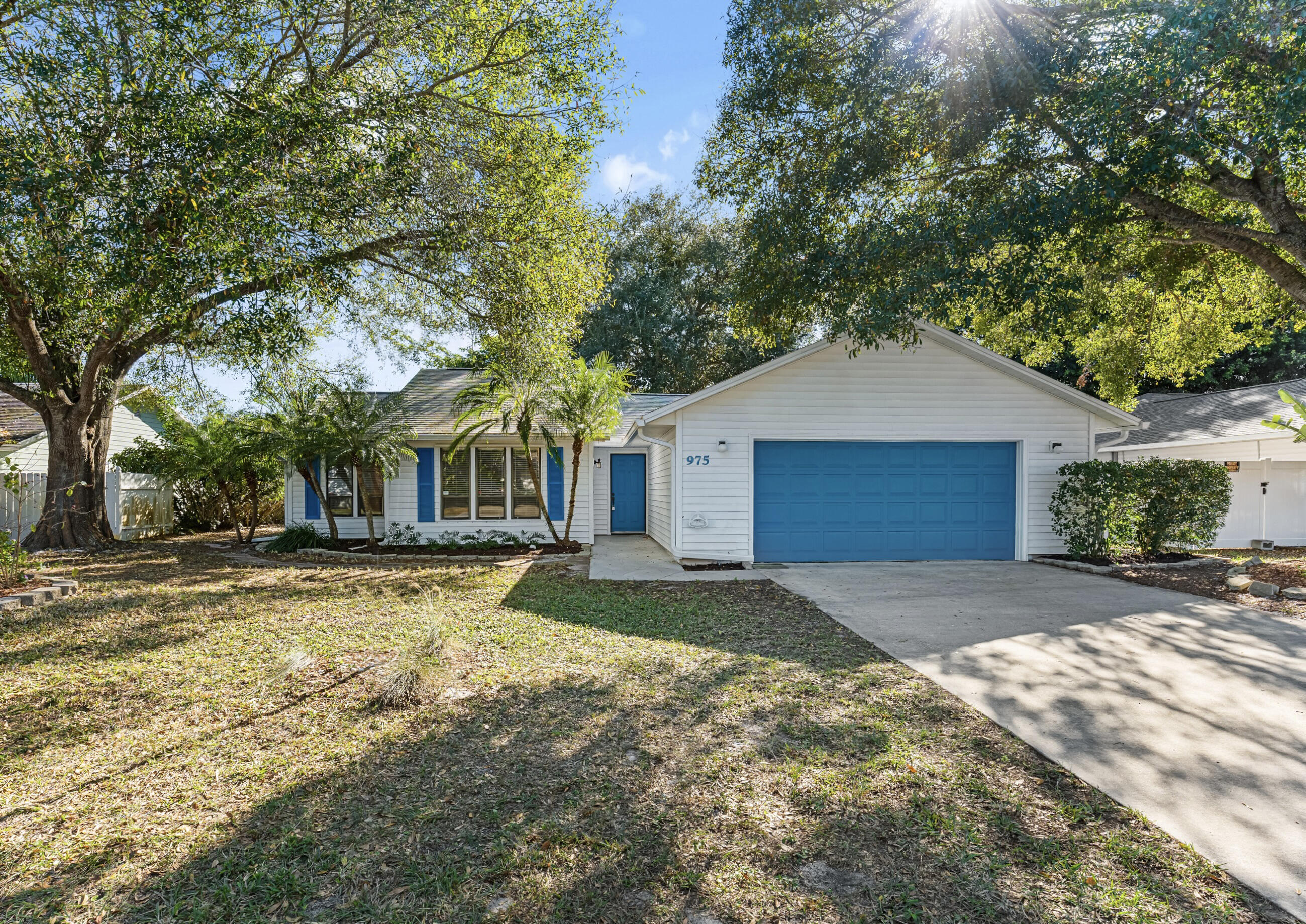 Situated in a friendly, established neighborhood with no HOA, this sweet 3/2 sits just 5 minutes from downtown restaurants and 10 minutes from bridges and beaches. Highlights of the remodelled kitchen include new cabinetry, appliances, custom seashell-accented countertops, and lots of natural light. The large backyard is shaded by mature oak trees with plenty of room for a pool. Full of charm and potential, other features include an oversized 2-car garage, rebuilt screened porch, 2022 roof, 2025 HVAC, and RainSoft water softener system. Easy to show — don't miss it! Roomszsapprox