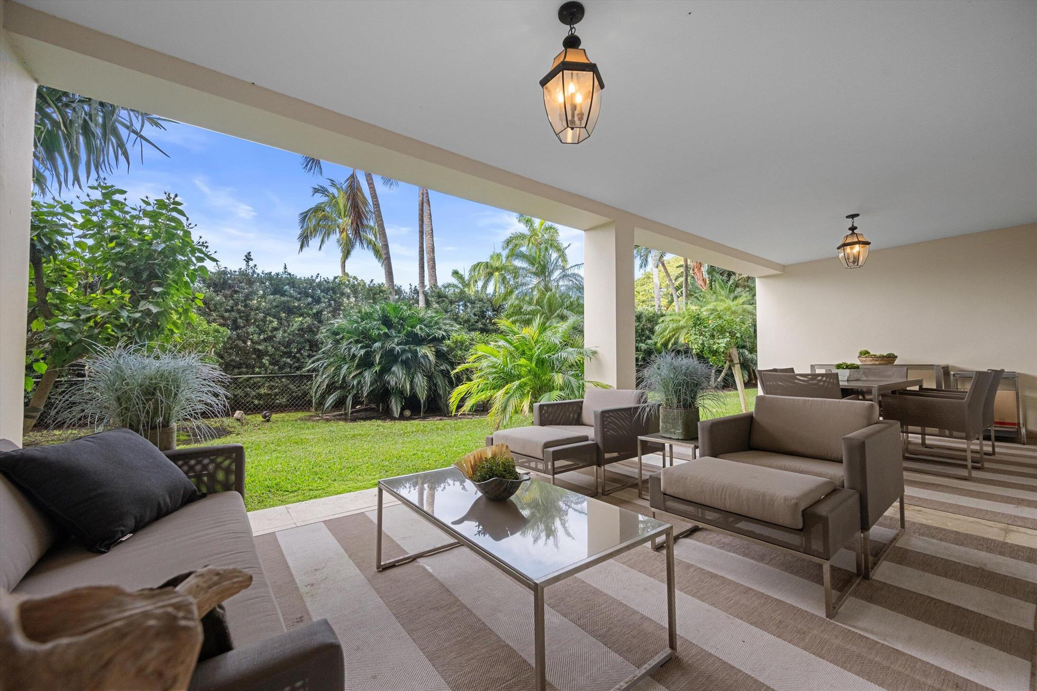 Exquisite 2-bedroom, 2-bath ground floor condo offers the perfect blend of comfort and convenience. The oversized bedrooms feature sunrooms, providing a bright and airy space for relaxation. The elegant living area combined with your covered patio overlooking your private fenced yard is ideal for entertaining guests or enjoying a quiet evening at home- a fabulous extension of your living space! Located in the classic Park Place boutique co-op with a pool and a dedicated 24/7doorman. Enjoy the vibrant lifestyle of Palm Beach with world-famous shopping on Worth Avenue just a short walk away, as well as the picturesque Four Arts gardens, and direct intracoastal access and park right across the street.