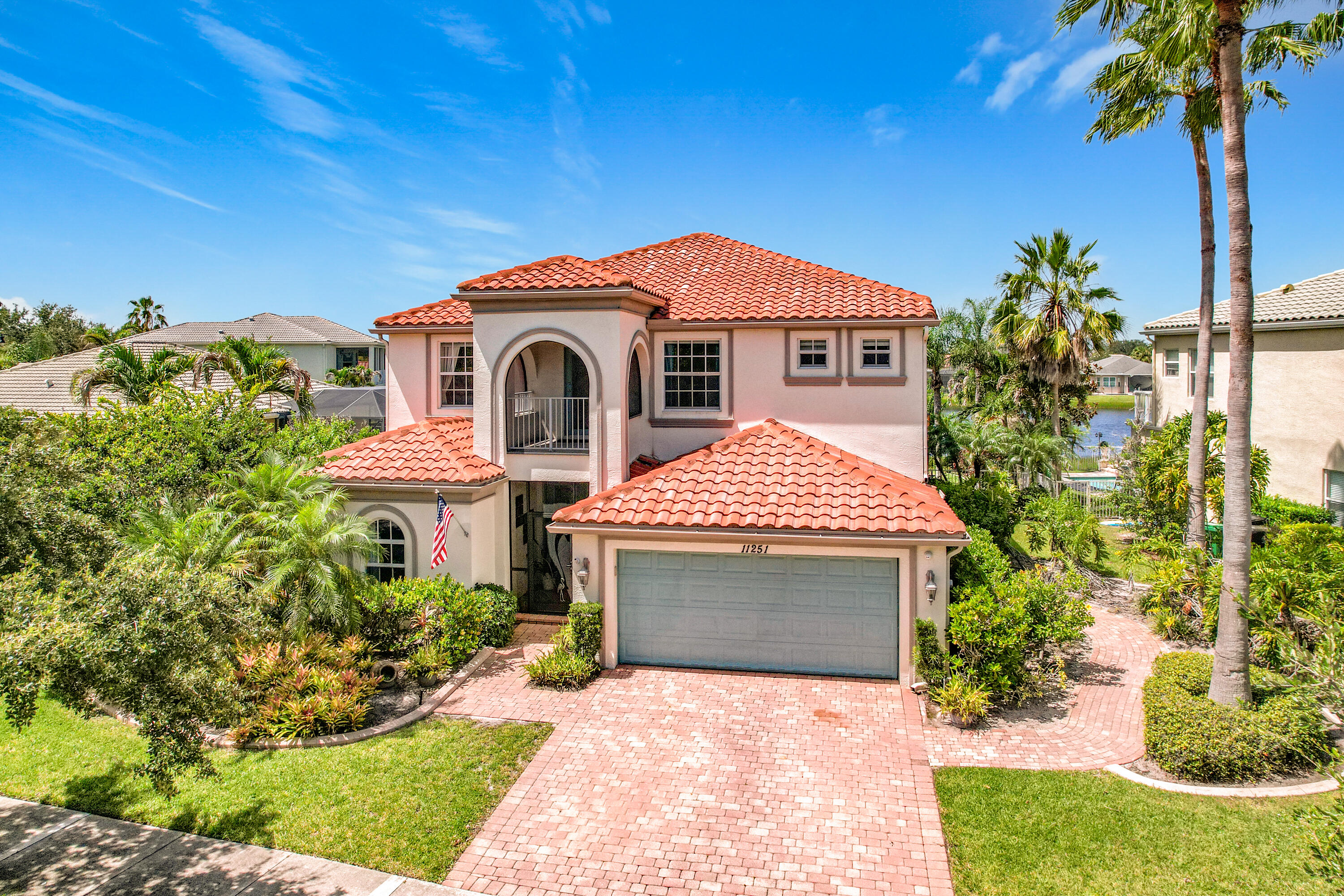 Spectacular, former model, POOL home in the exclusive community of Town Park! Solid concrete block on both floors and complete IMPACT GLASS will keep you safe through any storm! This huge home has 3 bedrooms, an office, and a media room but, could easily be converted into a 5 bedroom. You'll notice the luxury trim throughout including; crown molding, high end appliances, and upgraded flooring. The first floor media room has beautiful French doors and a full bar. The outdoor space is a tropical paradise with a massive free form pool, a screened lanai, professional landscaping, and a stunning view of the lake! The home also has a complete electric panel modification for a generator and the seller is also including a free generator!  HOA fees include; cable with HBO, high speed internet...  monitored security alarm, manned security gate and MORE! The clubhouse is a TWO minute walk away and is one of the best in town including a HUGE freeform pool that is heated to 78 degrees in the winter and chilled to 78 degrees in the summer AND a complete splash park for the kids! Don't miss out on your chance to own this piece of Florida Paradise!