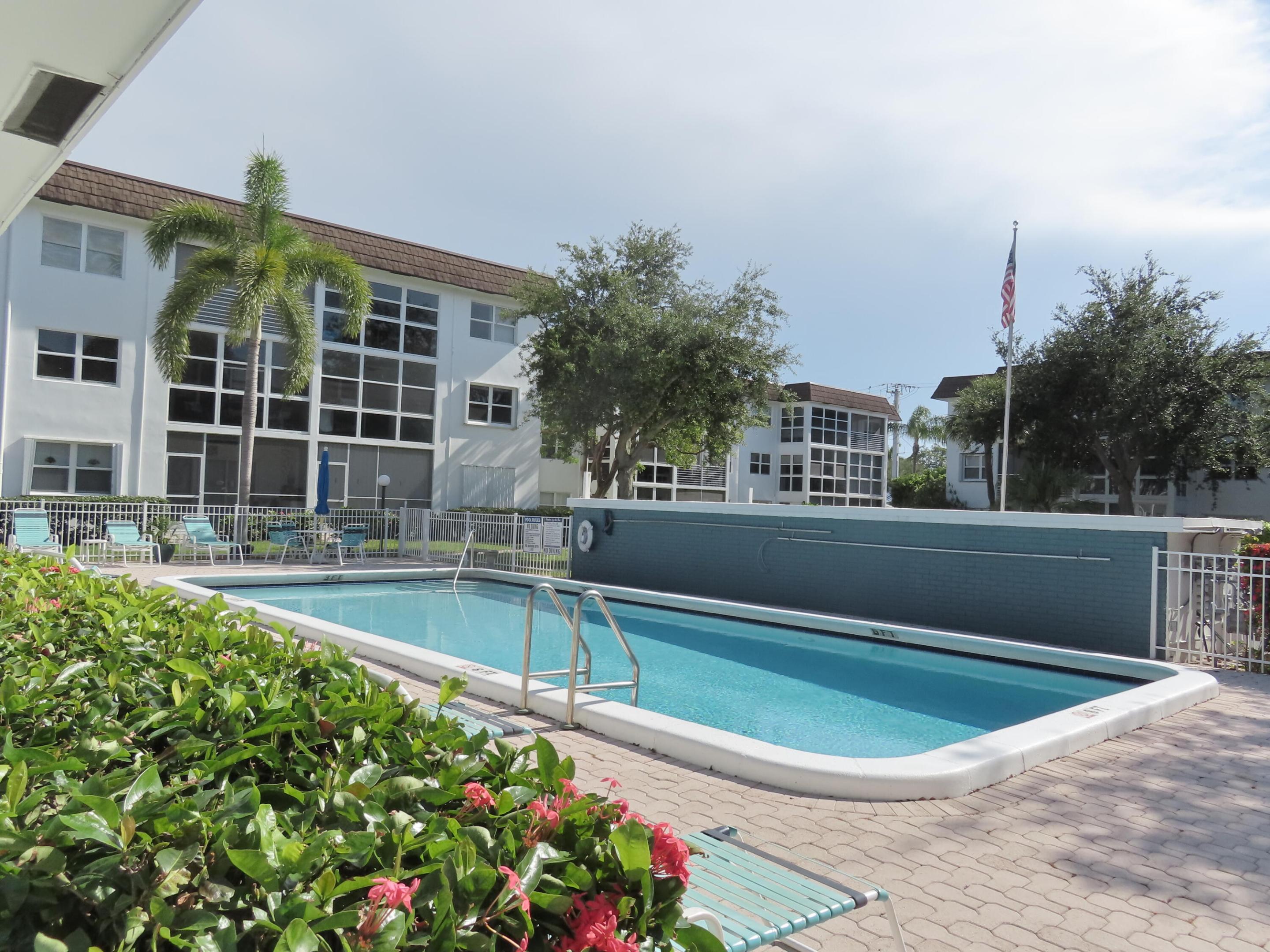 Across from the sand and positioned along one of South Florida's most desirable stretches of A1A, this location puts beaches, waterfront dining, beachside cafés, and everyday conveniences just minutes away. Enjoy an easy coastal lifestyle with the best of Pompano Beach and Fort Lauderdale right at your fingertips.  Spacious one bedroom, one and a half bath condo directly across from the beach on A1A, offering easy, walkable coastal living. This first floor unit features parking right outside your front door with no stairs or elevator needed, plus stainless steel appliances, a large primary suite with walk in closet, natural light, and excellent storage. Enjoy your own private patio with direct access to the heated pool. Pet friendly with plenty of parking