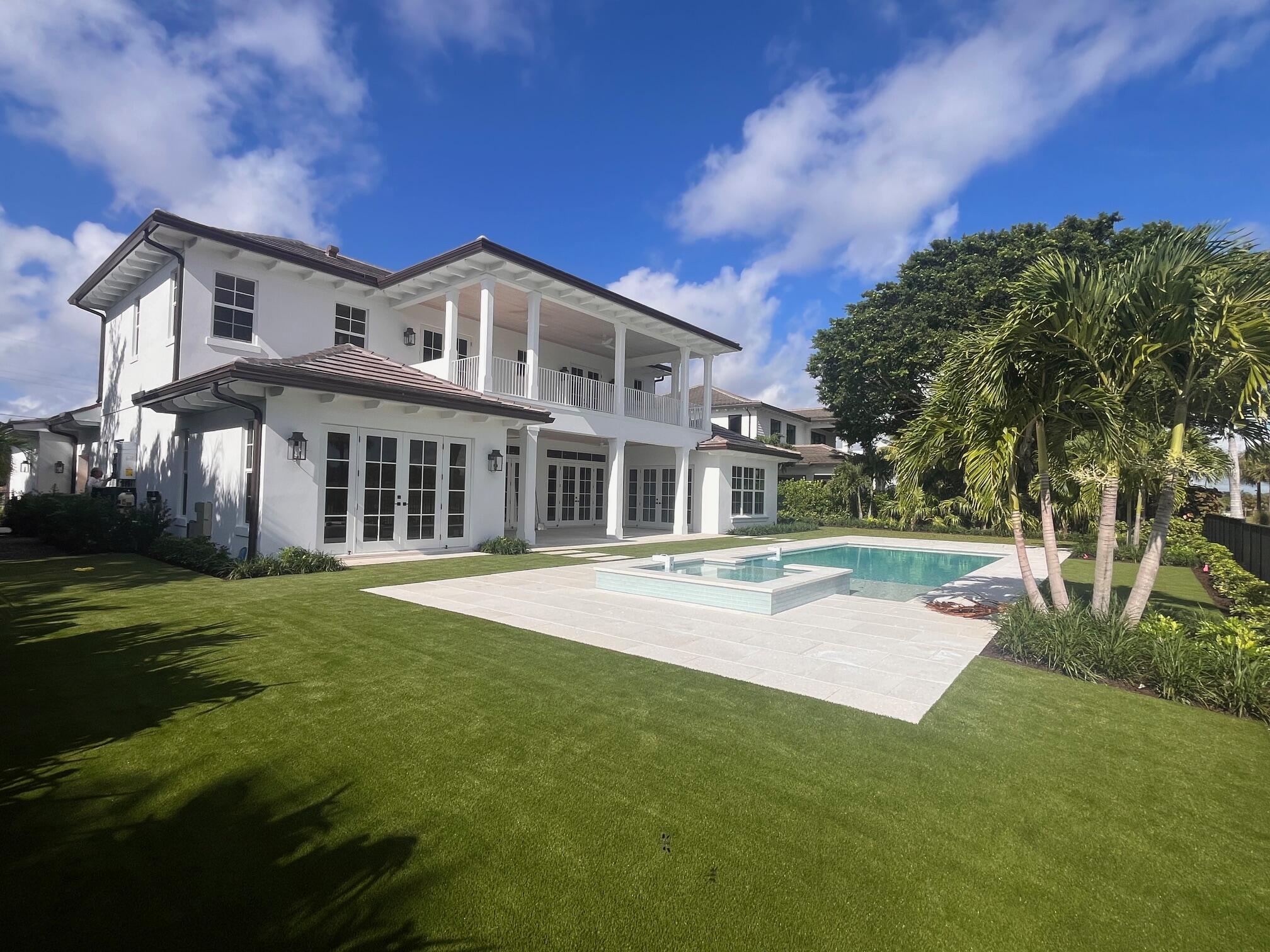 One-of-a kind new construction designed for this spectacular lot, featuring 120 ft frontage along the golf course.