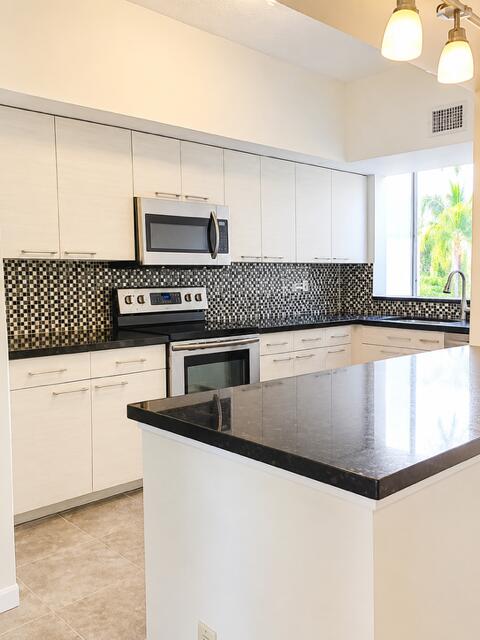 Great location in the heart of Coral Springs!!! Beautifully updated 2/2, 3rd floor end unit condo overlooking the sparkling community pool. This bright and spacious home features an updated kitchen, renovated bathrooms, tile flooring throughout the main living areas, stainless steel appliances, and a full-size washer and dryer in the unit.  The private open patio offers the perfect place to relax and enjoy the peaceful pool views. One assigned parking space with ample guest parking available. Conveniently located near parks, shopping, dining, major highways, and top-rated schools. Pets welcome. Don't miss this opportunity to live in one of Coral Springs' most desirable communities!!! Tenant in place until August 31, but assc needs up to 30 days for approval, process can start in July.