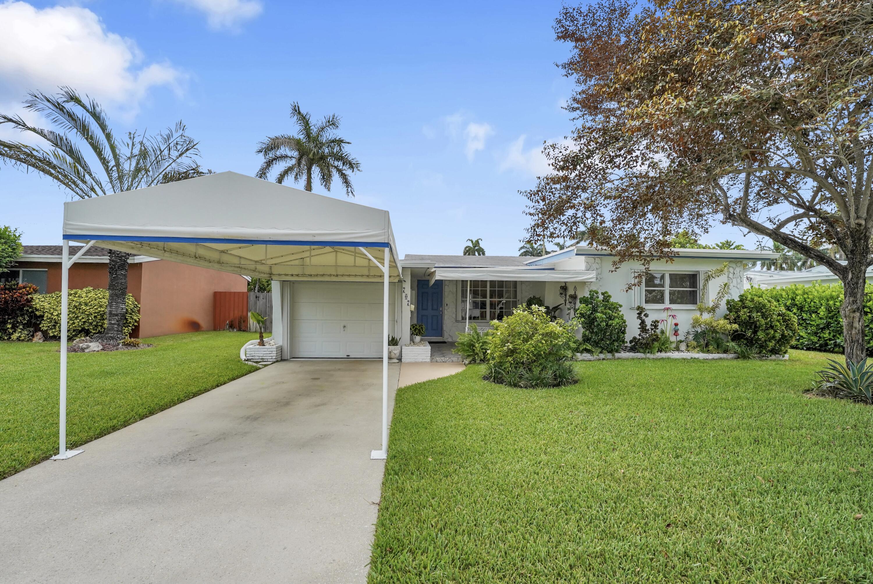 Welcome to your own private oasis in the heart of Hollywood! This beautifully updated 2-bedroom, 2-bath home offers the perfect blend of comfort and style—with NO HOA! Enjoy Florida living in your sparkling pool and relaxing outdoor space. Major updates provide peace of mind, including a newer roof, remodeled kitchen with new appliances, privacy fence, and accordion shutters/doors (2021). In 2022, the home received a new A/C, air ducts, water heater, washer, dryer, pest-resistant insulation, Category 4-rated patio awning, and artificial turf. The pool was enhanced with a new pump and Diamond Brite finish in 2023. Annual termite treatment and inspections complete this move-in-ready gem!