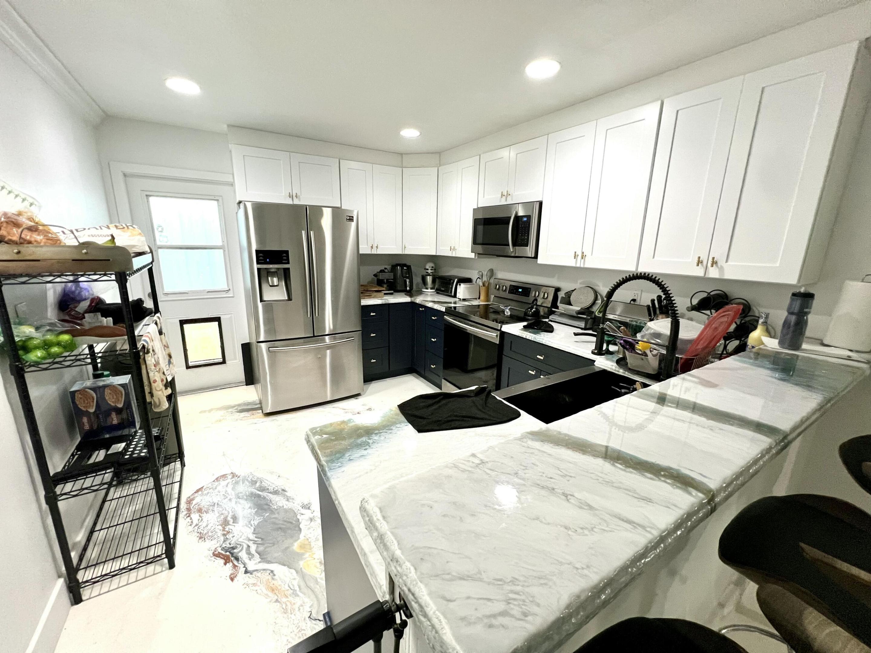 Come own your slice of Paradise. Centrally located in Palm Beach with easy access to I-95, 20 minutes to Jupiter & Boca and less than 5 minutes from the beach. This 3/2 home built in 2007 with CBS is less than $3.8k annually to insure. It also boast a 35 KW solar array on top of the home, keeping those power bills real cheap. The home features a completely fenced in yard, front and back perfect for those dog lovers. Ev Charger, Newly Remodeled Kitchen with Deep Farmhouse sink stainless steel appliances, Showings by appointment only, come on by take a look and make an offer.