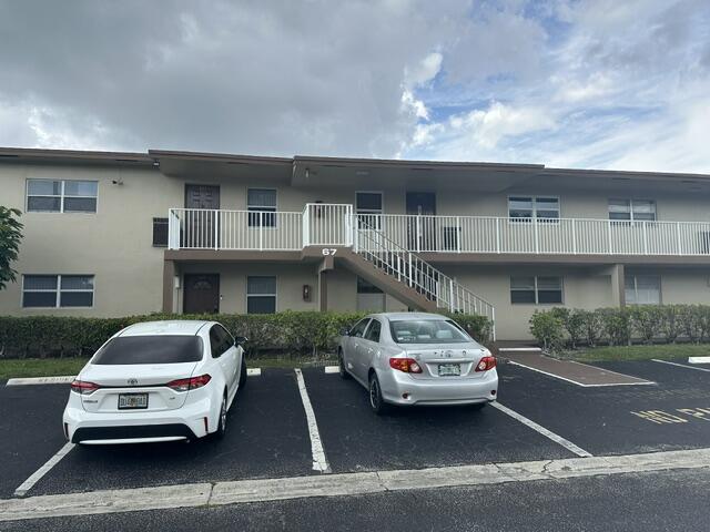 LOVELY TWO BEDROOM TWO BATH IN THE SENIOR COMMUNITY OF ORIOLE GARDENS SECTION TWO. HURRICANE IMPACT WINDOWS THROUGHOUT. BEAUTIFUL KITCHEN CABINETS, DINING LIVING COMBINATION, SECOND BEDROOM  AND BATH LIKE ITS OWN SUITE. ENCLOSED BALCONY. COMPLEX HAS A GREAT CLUBHOUSE WITH AN AUDITORIUM, LIBRARY, BILLIARDS, PING PONG, CARD ROOM, EXERCISE ROOM, TWO POOLS. ASSOCIATION STATES 55+, 700+ CREDIT, $25000-$30000 INCOME, APPLICATION, IN PERSON INTERVIEW, SECURITY DEPOSIT, 20% DOWN IF FINANCING. ASSOCIATION IS     CLOSE TO MALL, WALGREENS, PUBLIX, BANKS, RESTAURANTS AND MUCH MORE. SHORT DRIVE TO THE BEACH. THIS IS A GREAT BUY!!!