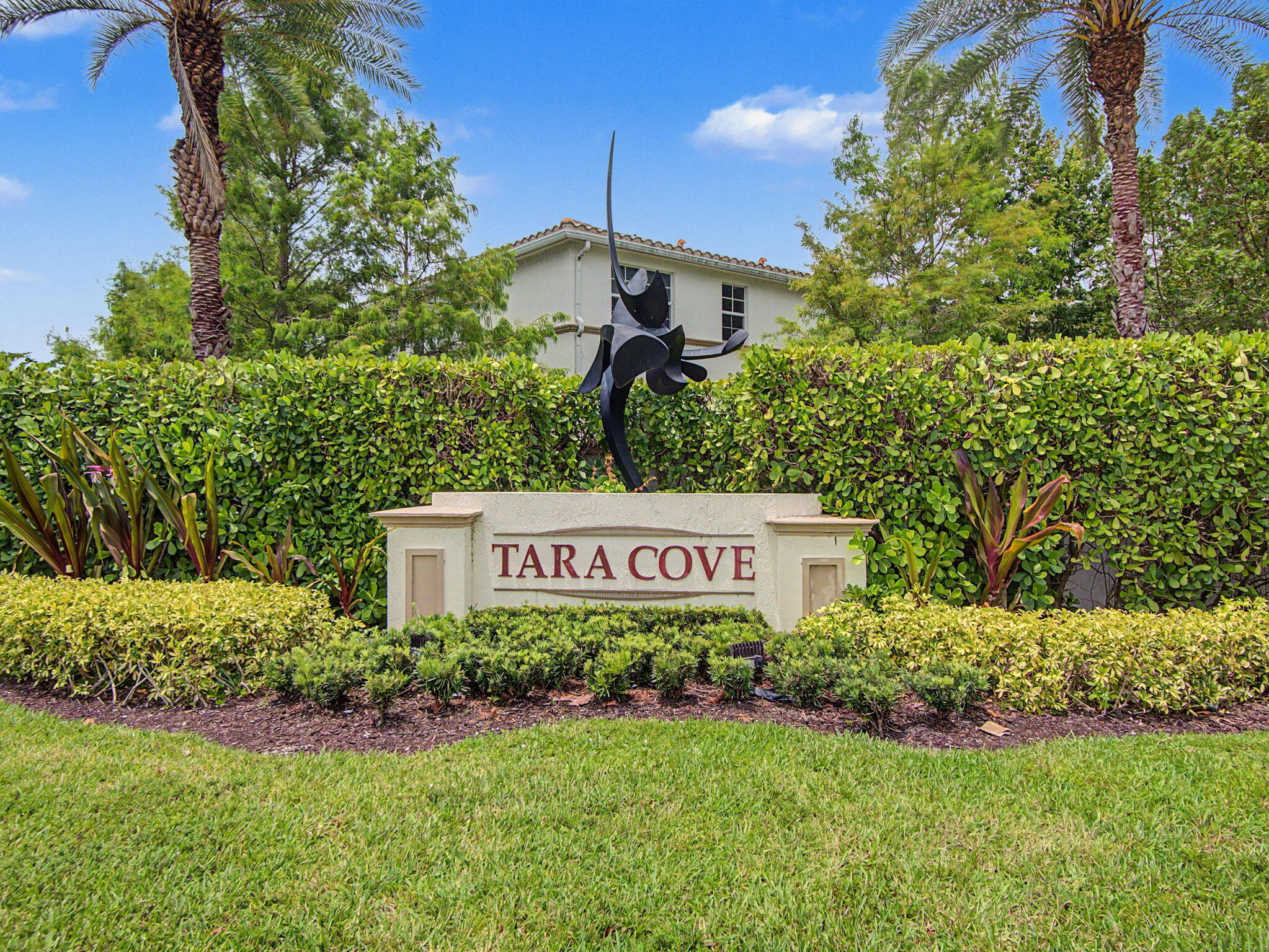 Experience elevated and tranquil waterfront living in this stunning lakefront townhome, built in 2016 and nestled within a prestigious gated community in West Palm Beach. Ideally located just minutes from downtown, major highways, premier shopping, fine dining, and entertainment, this impeccably maintained residence showcases the elegance and appeal of a professionally designed model home. Featuring three spacious bedrooms, two-and-a-half bathrooms, and thoughtfully curated upgrades throughout, the home boasts a beautifully updated chef-inspired kitchen, designer bathrooms, crown molding throughout, custom California Closet systems, modern lighting, and full-impact windows and doors for peace of mind and energy efficiency.  The luxurious primary suite offers a serene retreat with a spacious walk-in closet and a spa-inspired en-suite bath. Step outside to the beautifully tiled lakeside patio, complete with  retractable awning, for the perfect setting to unwind and enjoy breathtaking sunset views over the water. Additional highlights include a one-car garage, low-maintenance living, and picturesque lake views from multiple vantage points throughout the home. Residents enjoy access to exceptional community amenities, including a resort-style swimming pool, fitness center, basic cable, and Internet service as part of the HOA. This exceptional waterfront residence combines luxury, comfort, and convenience in one of West Palm Beach's most desirable gated communities. A truly remarkable property that must be seen to be fully appreciated.