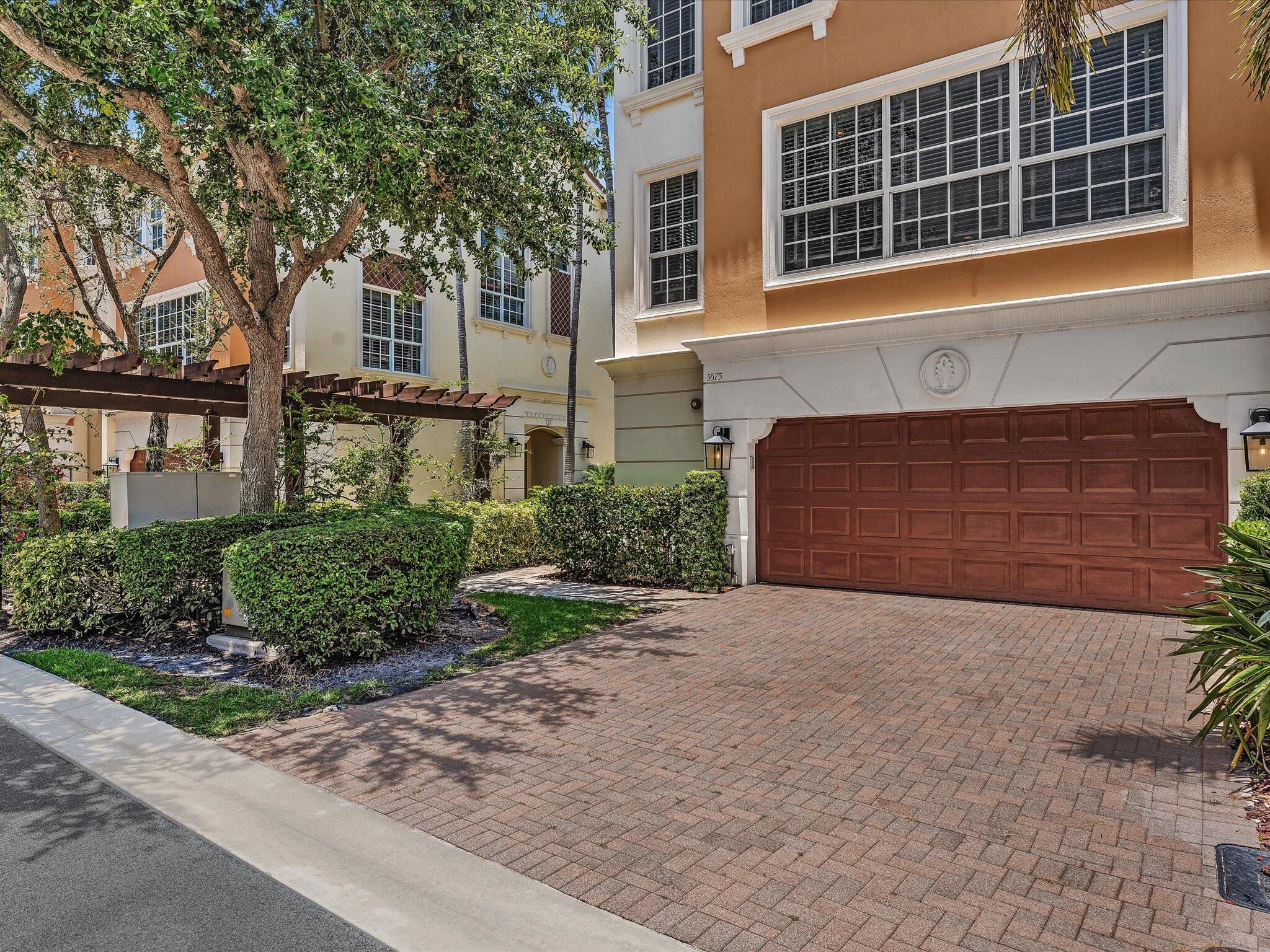 Welcome to this beautifully maintained three-story townhome in the sought-after gated community of Trieste in East Boca Raton. Offering more than 3,000 square feet of thoughtfully designed living space, this desirable end-unit residence enjoys added privacy with no neighboring home on one side and is filled with natural light throughout.  Designed for both comfort and functionality, the spacious floor plan features three bedrooms, two full bathrooms, two half baths, and a private elevator providing convenient access to all three levels. The home also includes a two-car garage, full impact windows and doors, a brand-new roof (2026), two new air conditioning systems (2025), and a newer gas water heater for added peace of mind. See more...  The quiet backyard offers both covered and open-air spaces, creating an inviting setting for outdoor dining, entertaining, or simply relaxing. Just a short stroll away, residents can enjoy the community swimming pool.  Ideally located just minutes from Boca Raton's beautiful beaches, Mizner Park, and the vibrant restaurants, shopping, and entertainment of Downtown Boca Raton, as well as the renowned Atlantic Avenue in Delray Beach, this move-in-ready home delivers the perfect combination of luxury, convenience, and low-maintenance living in one of East Boca Raton's most desirable botique communities.