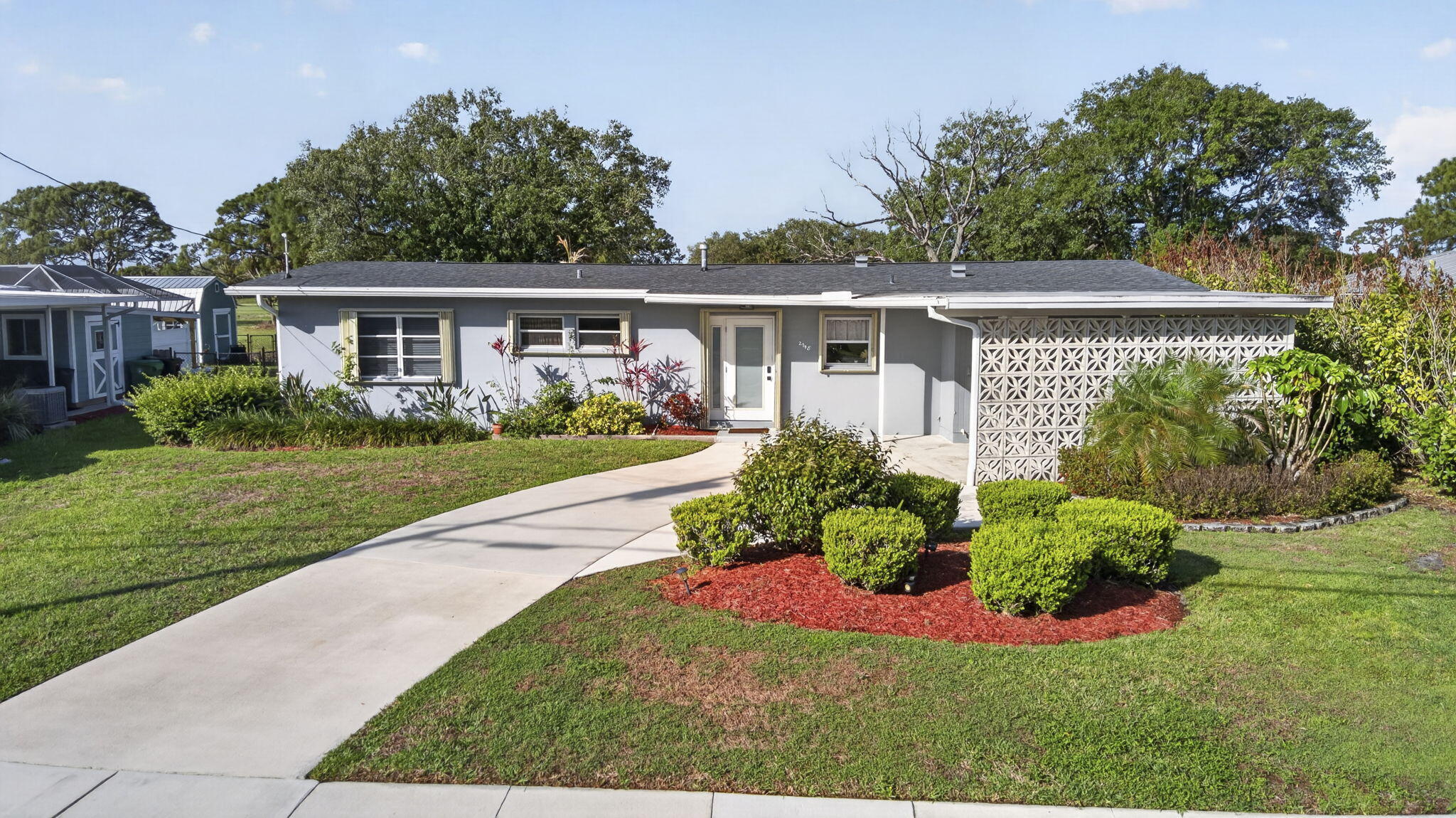 Gorgeous 3BR/2BA income-producing property in the desirable Sandpiper Bay area of Port St. Lucie. This well-maintained home offers a proven rental history, making it an ideal investment opportunity or full-time residence. Featuring a newer roof (2023); accordion shutters throughout for added protection and peace of mind, and fully renovated kitchen and bathrooms with modern finishes. All kitchen appliances (including a gas range), along with washer and dryer, have been recently replaced for a truly move-in-ready experience. Situated on a spacious lot with no HOA, this property offers flexibility for both investors and end users. Conveniently located near shopping, dining, golf, and beaches. A rare opportunity to own a fully renovated, income-generating property in a prime location!