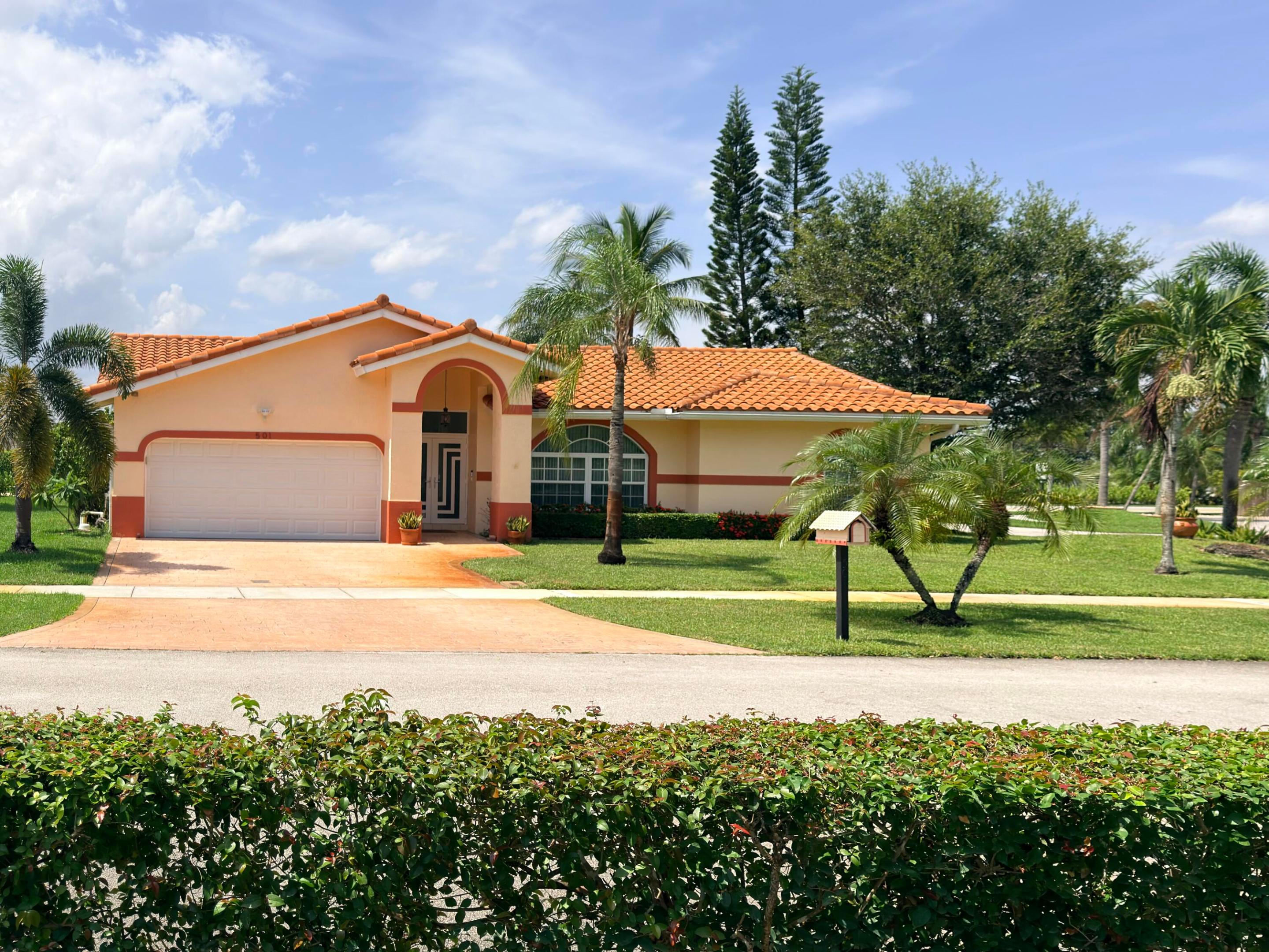 MOVE-IN READY! Rare 4BR/2BA home on a 9,722sf corner lot with road exposure on three sides and only one direct neighbor, offering exceptional privacy. Located directly across from a residents-only park with basketball courts and a tot lot. Features include impact windows and doors, a 7-year-old Spanish tile roof, 6-year-old HVAC, tile floors throughout, dedicated laundry room, and 2-car garage. The heart of the home is the updated chef's kitchen complete with quartz countertops, newer appliances, and ample cabinetry. Both bathrooms have been tastefully renovated in timeless, neutral tones. Enjoy the 300sf enclosed patio overlooking the expansive backyard with plenty of room to build your dream pool. Low $275/year HOA, Bonaventure Town Center amenities, and top-rated A+ Weston schools.