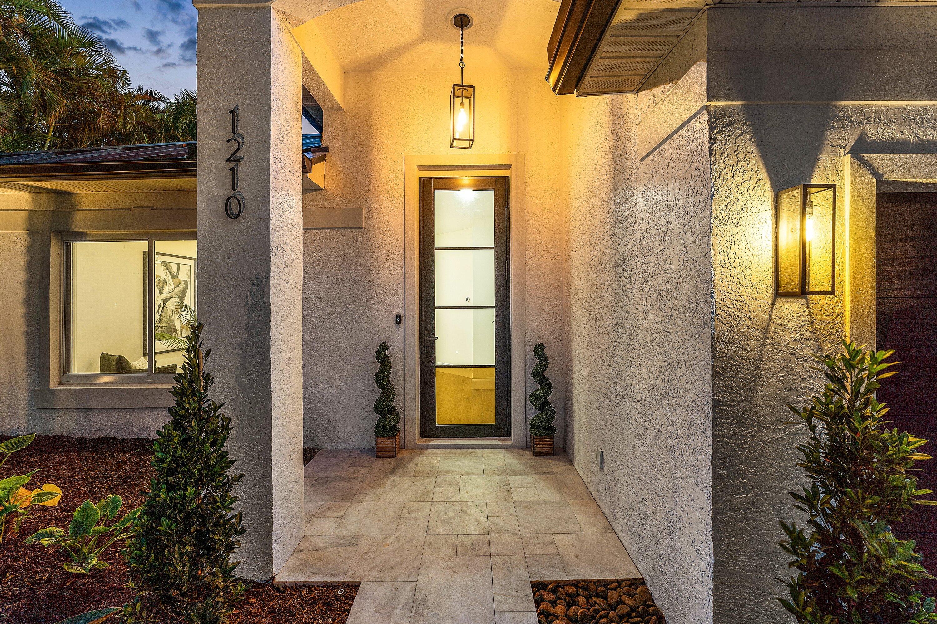 Exceptional modern masterpiece shows like a magazine model home located in the heart of Downtown Delray Beach. This magnificent heated pool home with spa features on one of the largest lots in Delray Lakes, one of the only gated communities in Downtown with some of the best amenities. This home features a massive eat-in island kitchen with additional breakfast bar area, Miele kitchen appliances, two (2) subzero refrigerators, complete impact doors and windows including garage door, floor to ceiling tile in both bathrooms, wall-to-wall Porcelain tile flooring throughout, including in the garage, large master bedroom, closet built-ins in all three (3) rooms, Toto and Eridanus bidet toilets in bathrooms, Bluetooth bathroom speakers, upscale lighting and recessed lighting with  dimmer switches and timers throughout, 40-year double underlayment aluminum roof in 2026, resurfaced pool & spa with new gulf stream heater, marble pavers at entry and pool deck with decorative turf inline design, landscape lighting and irrigation on timers with lush landscape redesign. Low HOA fee! Community amenities include pool, playground, parks, tennis/pickleball, boat and RV storage area, boat ramp access to popular Lake Ida, private gated community. Community located with the Delray Beach Freebie Zone. Furniture negotiable.
