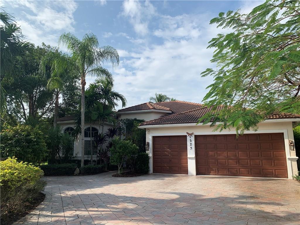 Cash buyers only, no appraisal, five day inspection period Only. 5th Bed is Office. Per Owner, Living Area is 3065 sq. ft. Fab Fox Ridge home sits on just under 1/2 Acre Lot w/Circular drive! Open floor plan w/3way split bedrooms. Updated Kitchen w/Granite & newer Appliances. 24"tile in Main areas/Laminate in bedrooms.2 zone A/C was replaced in 2010. 7 paddle fans. Master bath has double shower heads & separate tub.  Wood burning fireplace area in Family room. Fully Permitted generator too! Most of the home has accordion shutters. Lush Tropical Pool area w/Fountain, Fully Fenced yard, Great built-in barbecue grill! Note Newly renovated Fox Ridge amenities w/Park, Playground, Tennis. Walk to All schools. Home is being sold "As IS ". Buyer Pays $683. Capital Contribution to HOA at Closing.