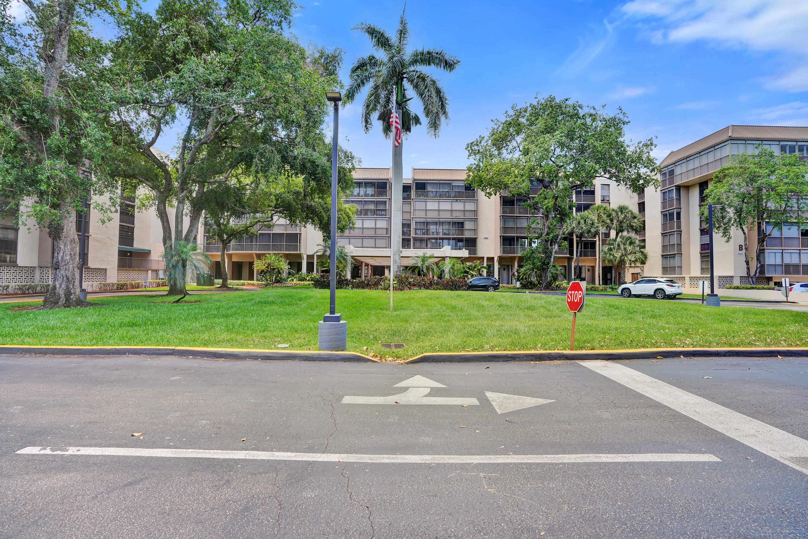 Beautifully updated one-bedroom, one-and-a-half-bath corner unit with exceptional privacy in the first building. This spacious residence features a clean, well-maintained kitchen with  new cabinetry,  tile flooring throughout, modernized bathrooms.  Spacious living and dining areas open to a large screened balcony Enjoy resort-style amenities including heated pool, jacuzzi, fitness center, billiards room, library, tiki huts with grills, gated entrance, covered parking, and guest parking. Maintenance includes cable and internet. Prime location close to shopping, dining, beaches, public transportation, and places of worship. Investor-friendly opportunity with no rental restrictions. No current special assessments and 40-year certification completed.  Easy to show. Please call listing agent in advance for all showings and appointments to ensure smooth coordination. Property is professionally presented and move-in ready, showcasing exceptional pride of ownership throughout. No special restrictions noted for showings. Ideal for qualified buyers seeking a fully renovated residence in a prime location within Emerald Hills, offering strong long-term value and lifestyle appeal in one of South Florida's most desirable communities.