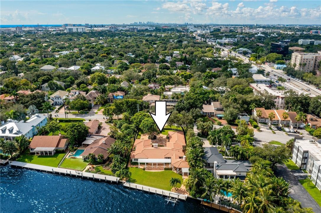 "Old Florida meets Modern Luxury" RARE opportunity to live in one of the coveted RIO VISTA RIVERFRONTESTATES!~21,000 lot features FULLY RENOVATED (2014),exquisitely crafted (Lavallee Builders),4 bed/4 bath,charming & impressive, single story Masterpiece! Featuring 106' of PRIME RIVERFRONT DOCKAGE, an endlessparade of boats, BIG YARD, composite dock, 24Klb./50 Amp boat lift & EASY ACCESS TO LAS OLAS EXCITEMENT!!Meticulously maintained grounds w/ huge covered gazebo/full summer kitchen, large lawn directly on river,welcoming Chicago Brick motor court/Italian Garden, & INCREDIBLE VIEWS of nearby downtown! The sublime,flowing Interior showcases elegant wood/stone flooring, stately gas fireplace, chef's kitchen w/butlers pantry, &luxurious bedrooms & bathrooms! Entertainers DREAM!