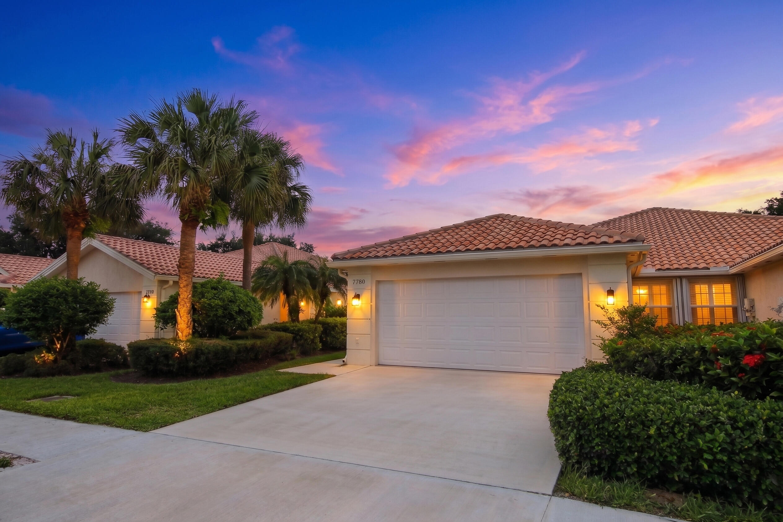 Welcome to Riverwalk, a guard-gated all ages community with resort style amenities designed for an active and social lifestyle centrally located 15 minutes from vibrant downtown West Palm Beach and Palm Beach International Airport. Here, low-maintenance living is the ultimate luxury!  This DiVosta built extended Capri model is nestled in the heart of the community and is the larger 1680 sq.ft vs the smaller 1526 sq.ft regular model. Step inside and you're greeted with vaulted ceilings, custom floor to ceiling built-ins, and tasteful upgrades like light wood luxury vinyl plank flooring and newer LED recessed lighting to keep things light and bright.   Wake up to serene lake views in the primary bedroom that features a spacious walk-in closet with built-ins for storage and organization.   Then get ready together in the dual sink bathroom that features beautiful upgraded quartz countertops and under cabinet lighting. With the split floor plan the guest bedroom is located on the opposite side of the home for privacy and also includes a walk-in closet as well as upgraded quartz countertop in the private bathroom.  You'll also have peace of mind knowing your home is fully protected with hurricane accordion shutters as well as a new A/C installed in June 2026 and hot water heater (2023). Enjoy the Florida winters and summers outside in your spacious lakeview screened patio, perfect for entertaining or just relaxing.   Riverwalk offers an impressive collection of resort-style amenities including a vibrant clubhouse, not 1 but 3 pools (lap pool, adult pool and resort style pool), Har-Tru tennis and pickleball courts with an on-site USPTA Pro.  But that's not all, residents also enjoy the fitness center, Bocce ball and playground for the kids. Plus, enjoy the extra convenience of an on-site Post Office, beauty salon and the Centanni Italian cafe in the charming Town Center.   The extensive HOA makes everyday living easy by including XFinity cable, regular full landscape of front, back and sides of home, exterior pest control, manned security gate and scheduled exterior house painting. So sit back, relax and actually enjoy the Florida life!  What truly sets Riverwalk apart is its natural beauty. Explore more than 12 miles of scenic walking and biking paths connected by charming cobblestone bridges crisscrossing the many waterways and lakes all surrounded by a nature preserve. Many daily destinations within the community are just a short walk, bike or golf cart ride away!  And when the day is done come home to this beautifully maintained 2 bed, 2 bath Capri villa that offers the space, privacy and feel of a single family home without the maintenance. Whether you're searching for a seasonal retreat, looking to downsize without the compromise, or seeking a home you can personalize over time, Riverwalk offers the perfect combination of lifestyle, convenience, and value. Conveniently located near I-95, Florida's Turnpike, world-class shopping, dining, beaches, golf and hospitals, Riverwalk places everything South Florida has to offer within easy reach. Come experience why it's one of West Palm Beach's most sought-after communities.