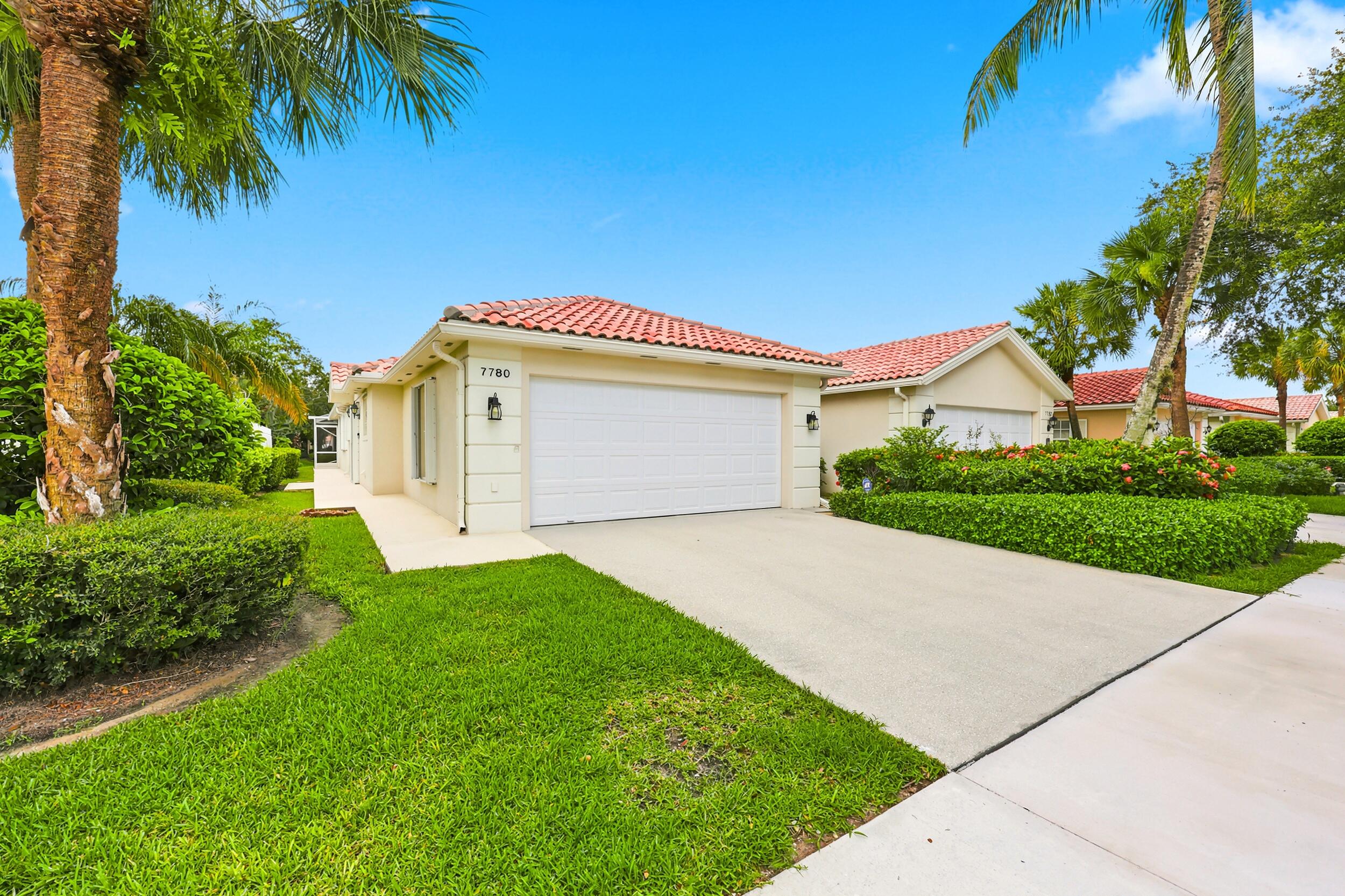 Welcome to Riverwalk, a guard-gated all ages community with resort style amenities designed for an active and social lifestyle centrally located 15 minutes from vibrant downtown West Palm Beach and Palm Beach International Airport. Here, low-maintenance living is the ultimate luxury!  This DiVosta built extended Capri model is nestled in the heart of the community and is the larger 1680 sq.ft vs the smaller 1526 sq.ft regular model. Step inside and you're greeted with vaulted ceilings, custom floor to ceiling built-ins, and tasteful upgrades like light wood luxury vinyl plank flooring and newer LED recessed lighting to keep things light and bright.   Wake up to serene lake views in the primary bedroom that features a spacious walk-in closet with built-ins for storage and organization.   Then get ready together in the dual sink bathroom that features beautiful upgraded quartz countertops and under cabinet lighting. With the split floor plan the guest bedroom is located on the opposite side of the home for privacy and also includes a walk-in closet as well as upgraded quartz countertop in the private bathroom.  You'll also have peace of mind knowing your home is fully protected with hurricane accordion shutters as well as a new A/C installed in June 2026 and hot water heater (2023). Enjoy the Florida winters and summers outside in your spacious lakeview screened patio, perfect for entertaining or just relaxing.   Riverwalk offers an impressive collection of resort-style amenities including a vibrant clubhouse, not 1 but 3 pools (lap pool, adult pool and resort style pool), Har-Tru tennis and pickleball courts with an on-site USPTA Pro.  But that's not all, residents also enjoy the fitness center, Bocce ball and playground for the kids. Plus, enjoy the extra convenience of an on-site Post Office, beauty salon and the Centanni Italian cafe in the charming Town Center.   The extensive HOA makes everyday living easy by including XFinity cable, regular full landscape of front, back and sides of home, exterior pest control, manned security gate and scheduled exterior house painting. So sit back, relax and actually enjoy the Florida life!  What truly sets Riverwalk apart is its natural beauty. Explore more than 12 miles of scenic walking and biking paths connected by charming cobblestone bridges crisscrossing the many waterways and lakes all surrounded by a nature preserve. Many daily destinations within the community are just a short walk, bike or golf cart ride away!  And when the day is done come home to this beautifully maintained 2 bed, 2 bath Capri villa that offers the space, privacy and feel of a single family home without the maintenance. Whether you're searching for a seasonal retreat, looking to downsize without the compromise, or seeking a home you can personalize over time, Riverwalk offers the perfect combination of lifestyle, convenience, and value. Conveniently located near I-95, Florida's Turnpike, world-class shopping, dining, beaches, golf and hospitals, Riverwalk places everything South Florida has to offer within easy reach. Come experience why it's one of West Palm Beach's most sought-after communities.