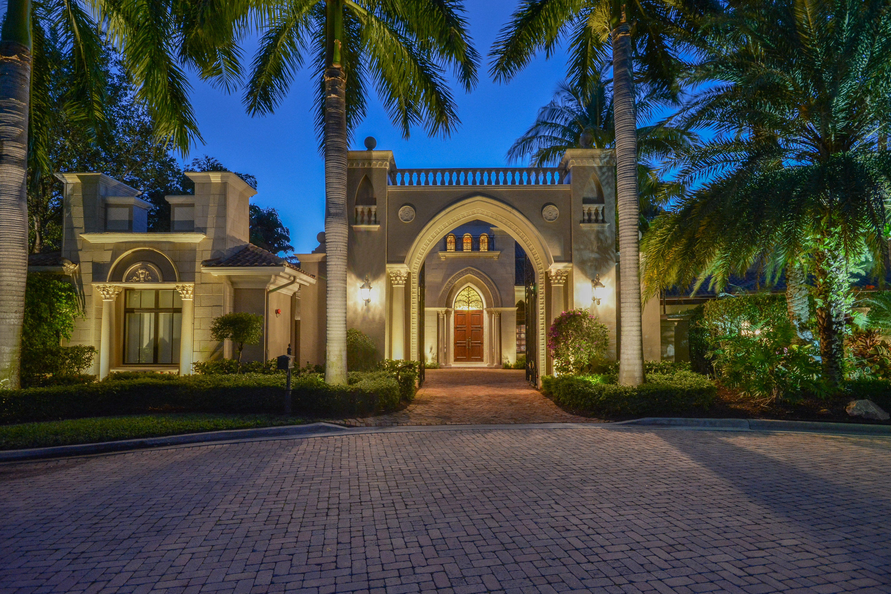 Magnificent residence on the grounds on the Boca Raton Resort & Club in Mizner Lake Estates. Privately located at the end of the street on the cul de sac overlooking wide golf course fairway views. Residence was fully renovated with a chef's kitchen, top of the line wolf appliances and finishes. The layout includes 5 bedrooms, office, 6.1 baths. All on one level. The master wing offers spacious walk in closets and separate his and hers baths. The grand dining room has a custom wood table to sit twenty people. Other features include: billiards room, walk in wine room, lush landscaping across the backyard, guest house and a three car garage. Exceptionally tall ceilings throughout the residence and the home is equipped with the finest finishes for today's standards.