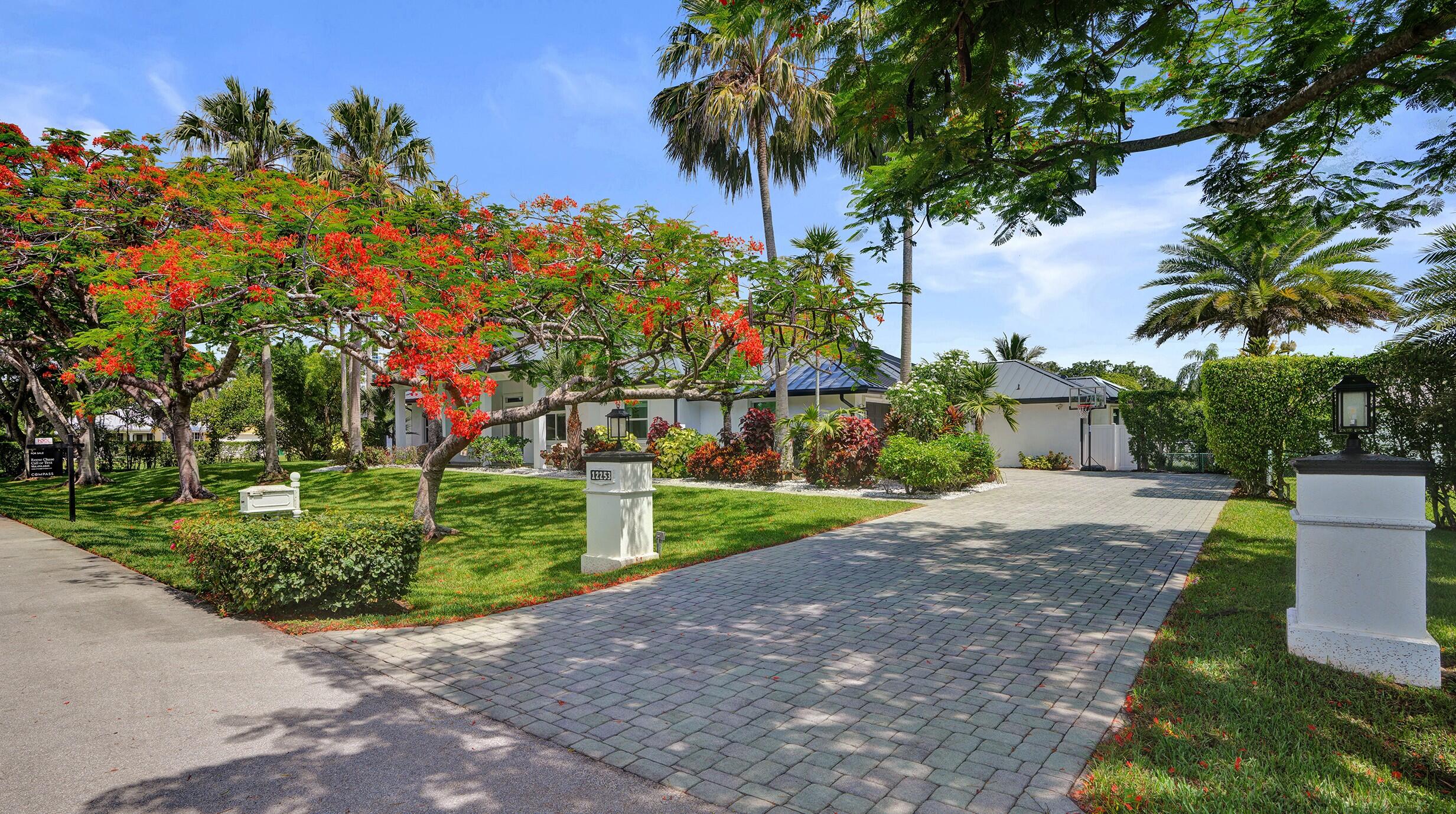 Nestled on a quiet cul-de-sac in Plantation Acres with no HOA, this stunning custom 6BD/4BA estate with a dedicated home office checks every box. The thoughtfully designed layout features a children's wing with a playroom / bonus room and an expansive kitchen boasting granite countertops, a huge island, custom cabinetry & a walk-in pantry. The luxurious primary suite features rich Brazilian cherry wood floors, and every bathroom has been beautifully renovated. Step outside to your private South Florida oasis, a screened-in saltwater pool, summer kitchen, covered patio, perfect for year-round entertaining under the sun. Total peace of mind with a brand-new 2024 metal roof, full impact windows & doors, standby generator, & a spacious 3-car garage, all on a sprawling lot!