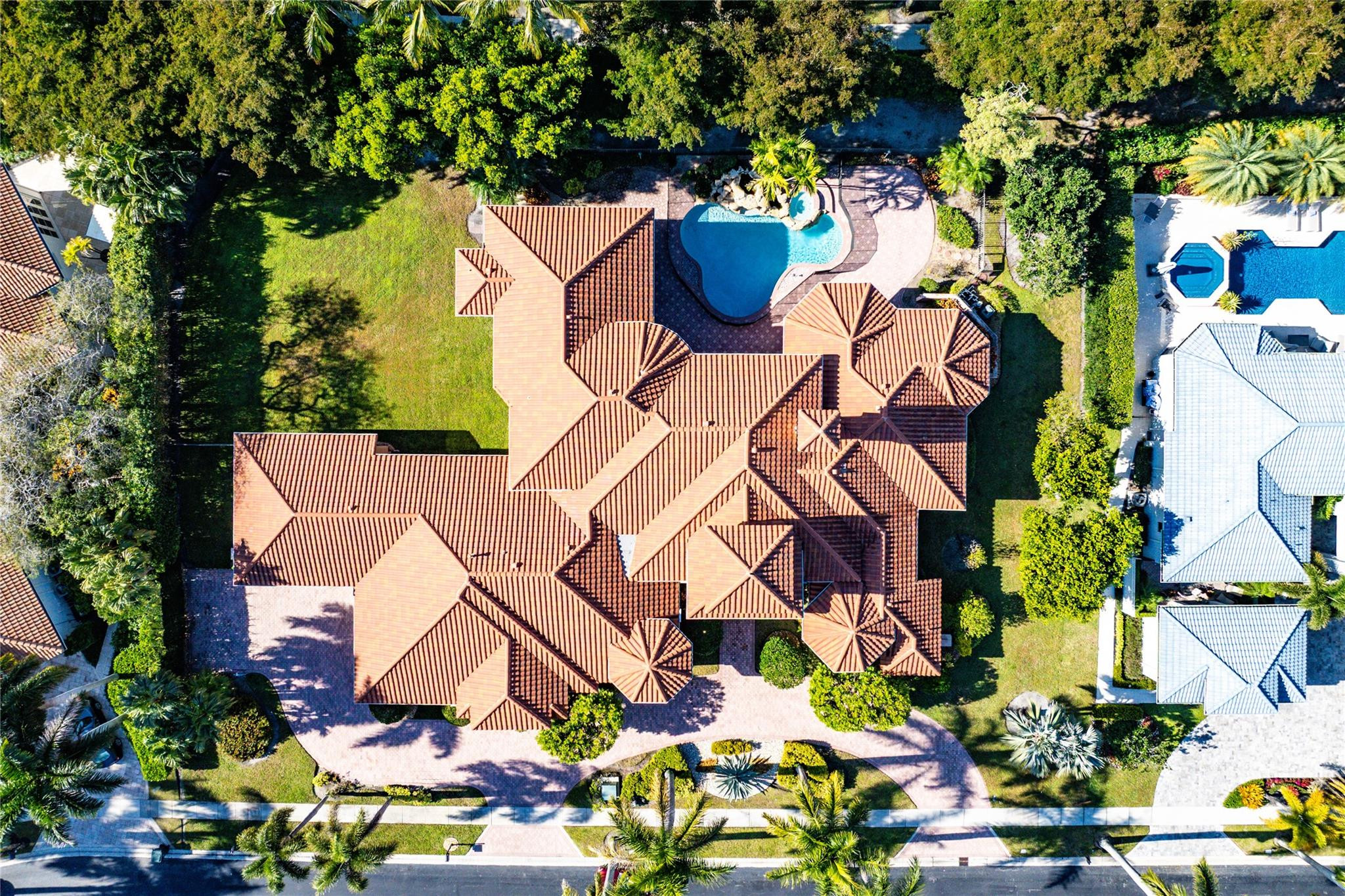 Extremely rare and highly coveted, this is one of the few double lot opportunities in the prestigious Coventry of Woodfield Country Club. Set on an oversized parcel with commanding street presence, the scale and proportions of this property immediately set it apart. For the discerning end-user, this is the chance to reimagine and elevate the existing residence into a custom estate that would stand among the most prominent homes in Woodfield. For developers and investors, the double lot configuration introduces endless potential for redevelopment or possible lot subdivision (subject to approvals), creating a rare chance to maximize value in one of Boca's most sought-after country club communities. 3754 Coventry represents a legacy opportunity defined by land, scale, and vision