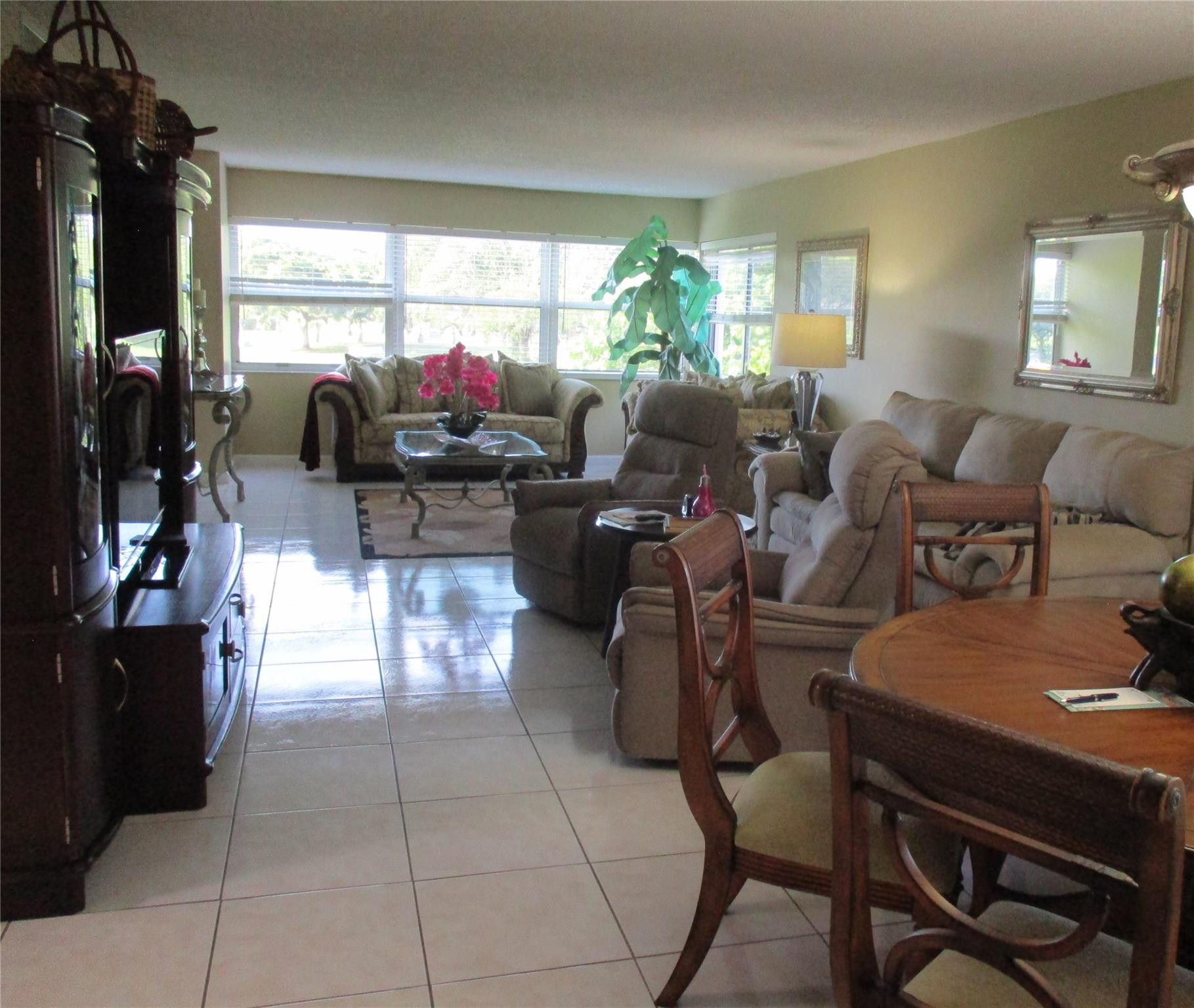 BEAUTIFUL, AND SPACIOUS CORNER UNIT OFFERING ABUNDANT NATURAL LIGHT AND STUNNING VIEWS OF THE GOLF COURSE, 55+ COMMUNITY. IT FEATURES HIGH IMPACT WINDOWS, BOTH BATHROOMS HAVE BEEN FULLY RENOVATED AND TILE IN  LIVING AREAS.  EXCLUSIVE RESORT-STYLE AMENITIES INCLUDE INDOOR AND OUTDOOR HEATED POOLS, SPA, FITNESS CENTER, TENNIS, CLUBHOUSE WITH YEAR-ROUND ACTIVITIES, SOCIAL EVENTS, THEATER, 9-HOLE GOLF COURSE, AND MORE. MAINTENANCE INCLUDES CABLE, INTERNET, WATER, & BUS SERVICE. GREAT LOCATION CLOSE TO SHOPPING, RESTAURANTS, BANKS, ETC.