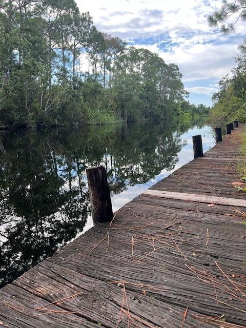 Amazing property in Leisure Lakes on the canal with fixed dock! .25 acres [adjoining lot-1137- for sale as well!] Partially cleared, driveway, perfect to build your dream home or get-a-way and have access to all your favorite water sports right at your back door! Direct access to Lake Carrie and to Lake June!

All measurements are approximate.