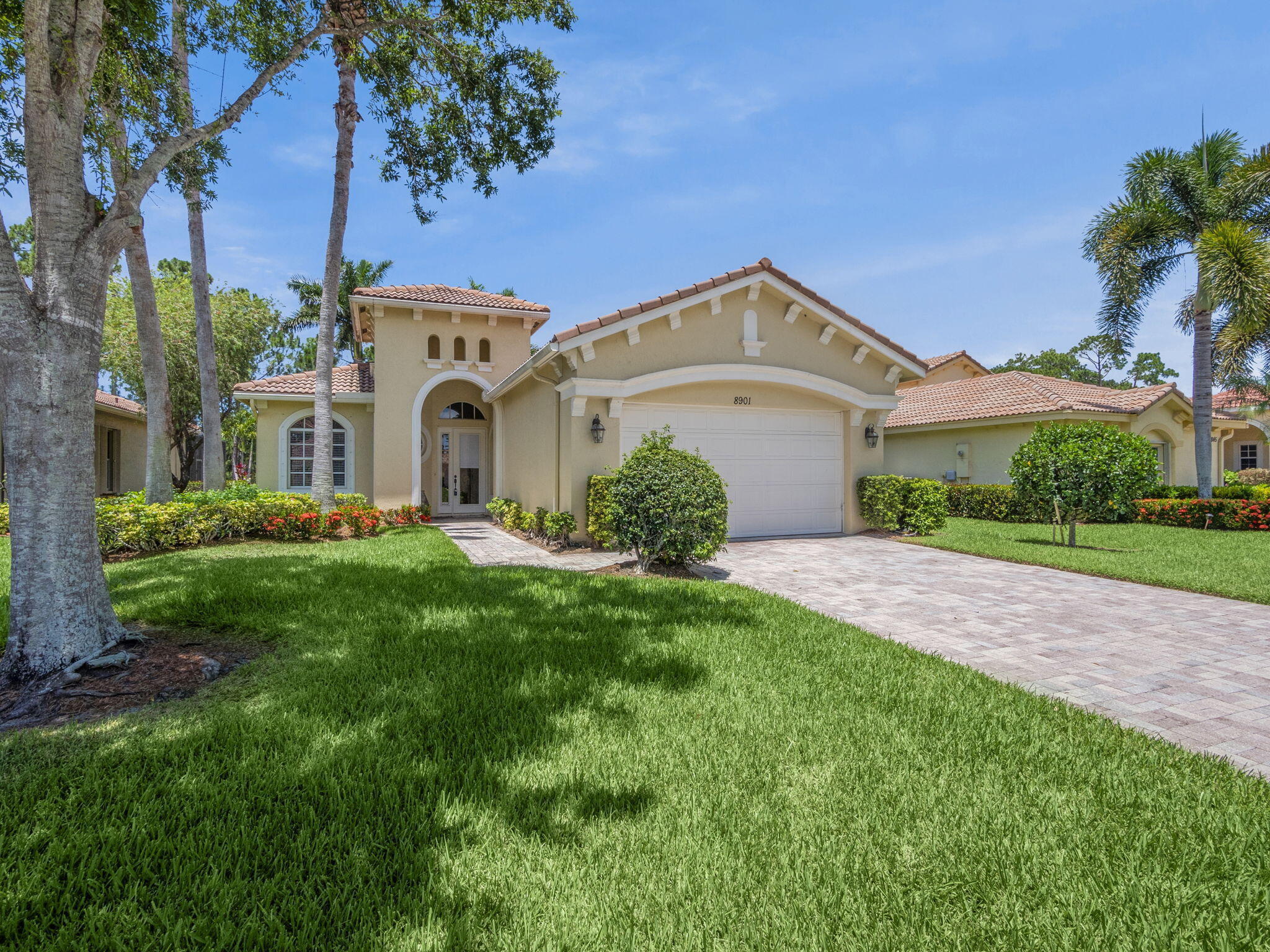 Lovely Furnished Home with Golf Course View.  This 2 possible 3BD and 3BA Fairview Model is found in the Lakes of PGA Village.  Home has cathedral and tray ceilings.  Wonderful floor plan open and perfect for entertaining.  Large Kitchen with loads of cabinets, granite counter tops and SS Appliances.  Kitchen opens to dining area that can handle a large group.  Grand family room with large sliding doors that open to the extended patio and exotic waterfall.  Spacious Master Bedroom, cabana bath, generous closets and Master Bath complete with Roman tub, dual sinks, and separate shower,  Comfortable 2nd BD, poss 3rd Bedroom or Den.  Great Location close to Clubhouse.  Situated along Wannamaker Golf Course,  Best deal in PGA, just bring your toothbrush!