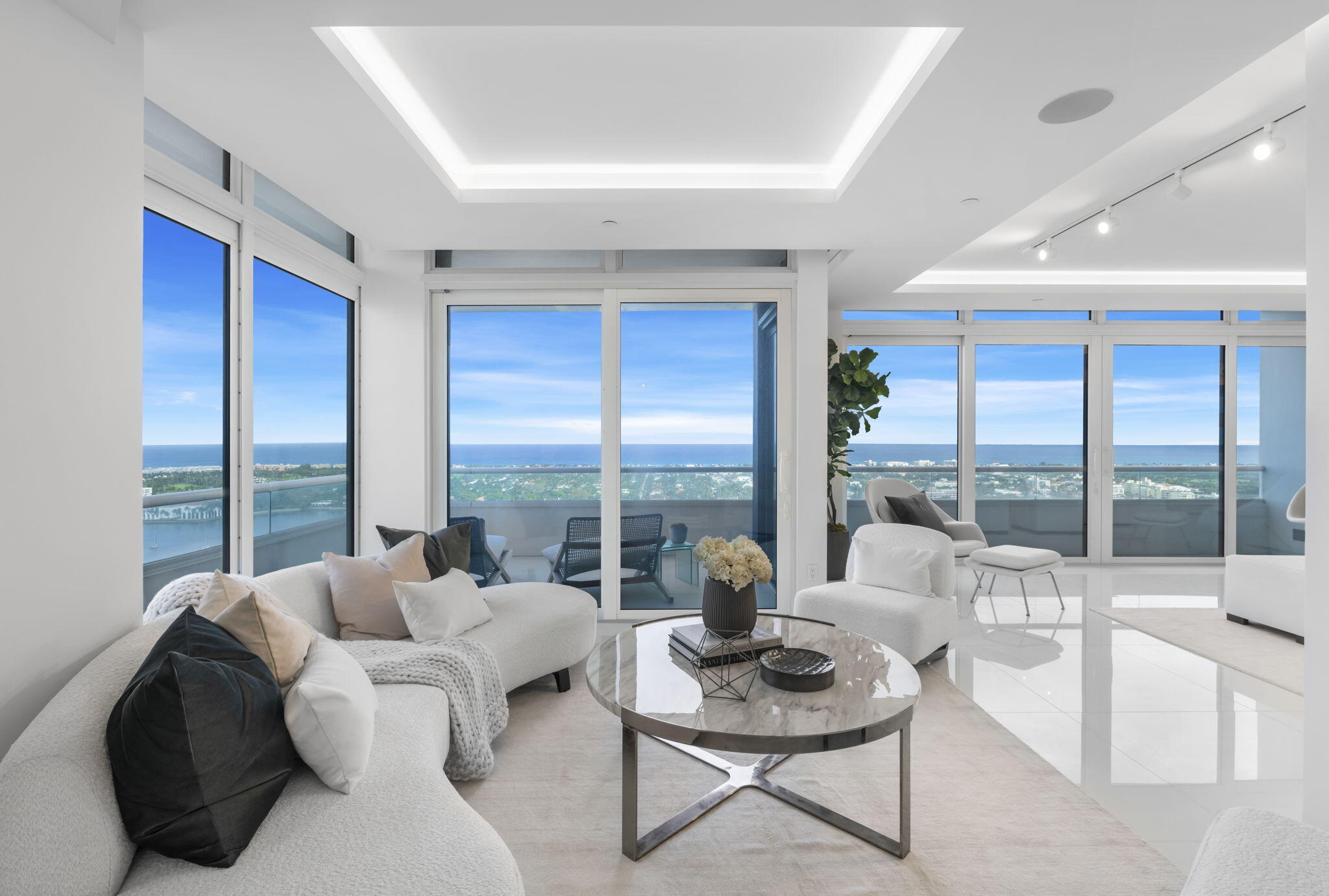 BRAND NEW PENTHOUSE representing the epitome of modern luxury! Every detail is pristine, boasting breathtaking panoramic views, 3-beds + office, 3-baths, 2 powder rooms, and a suite of high-end features. Designer kitchen features Gaggenau & Miele appliances, Waterworks faucets and Lutron control/shade system throughout— this residence offers an unparalleled level of sophistication. Primary suite has dual mammoth sized dressing rooms/custom closets. Renovations extend to new A/C, plumbing, electrical, element lighting, CAT6 (wiring throughout), plus much more. Includes deeded Cabana with full bath. The Plaza offers amazing amenities and first-class staff including 24-hour valet,concierge,security, impressive fitness center,sauna,tennis/pickleball courts,2 pools... Conveniently located 2 minutes from Palm Beach Island.