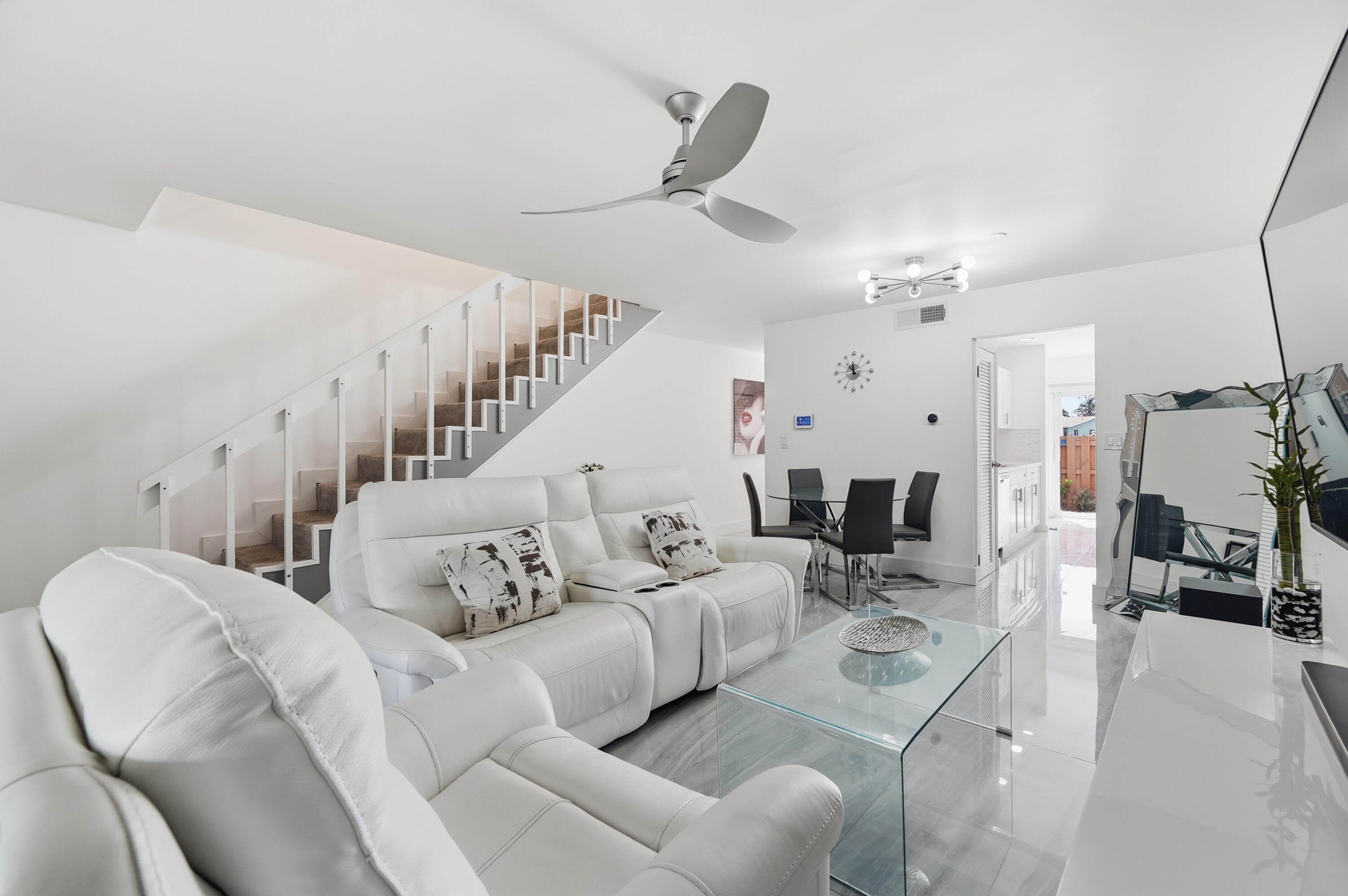 Stunning Waterfront Townhome | 2 Bed / 2.5 Bath Beautifully renovated top to bottom, this two-story townhome in Sunrise's Country Squire community is truly move-in ready. Featuring both a front and back patio, there's no shortage of space to entertain or unwind. The large screened-in back patio offers direct water views a serene backdrop you'll never tire of. Spacious bedrooms, 2 full baths,& a 1/2 bath.Roof 2024, A/C 2019, impact glass. Washer/Dryer 2022. Community amenities include a pool, tennis courts, and clubhouse, plus two assigned parking spaces. Just a short drive to Fort Lauderdale beaches and only 15 minutes from Fort Lauderdale/Hollywood International Airport, ideal for beach lovers and frequent travelers alike. Opportunities like this don't last, schedule your showing today.