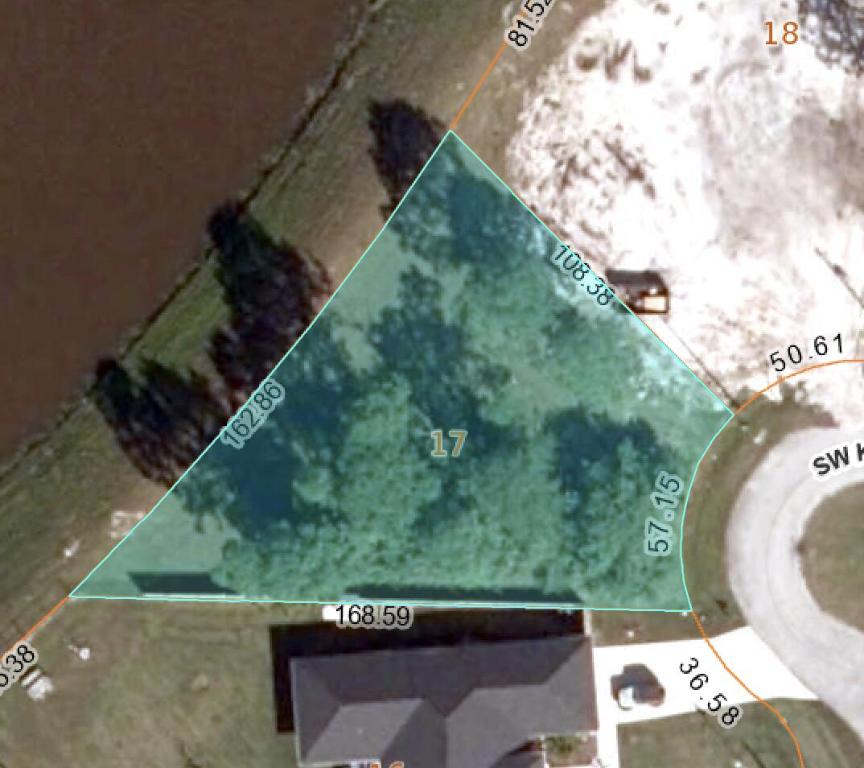 Design your ultimate Florida sanctuary on this exceptional 0.38-acre oversized lot, perfectly positioned at the end of a private, low-traffic cul-de-sac. Offering significantly more space, this property provides the ideal canvas for a sprawling custom estate with ample room for a resort-style pool, extended patio, and lush tropical landscaping. With canal views adding a serene backdrop to your future backyard oasis, this property promises privacy and tranquility while remaining free from the restrictions and fees of an HOA, giving you the freedom to bring your unique vision to life. Located in one of Port St. Lucie's fastest-growing corridors, this prime piece of real estate combines secluded living with unmatched convenience. With easy access to the Florida Turnpike and I-95, while local families enjoy proximity to top-rated schools, lively dining, and the newest shopping destinations. Whether you are an investor looking to capitalize on the area's booming new construction market or a homeowner ready to break ground on your forever residence, this cleared and ready-to-build site offers endless possibilities in a premier location.