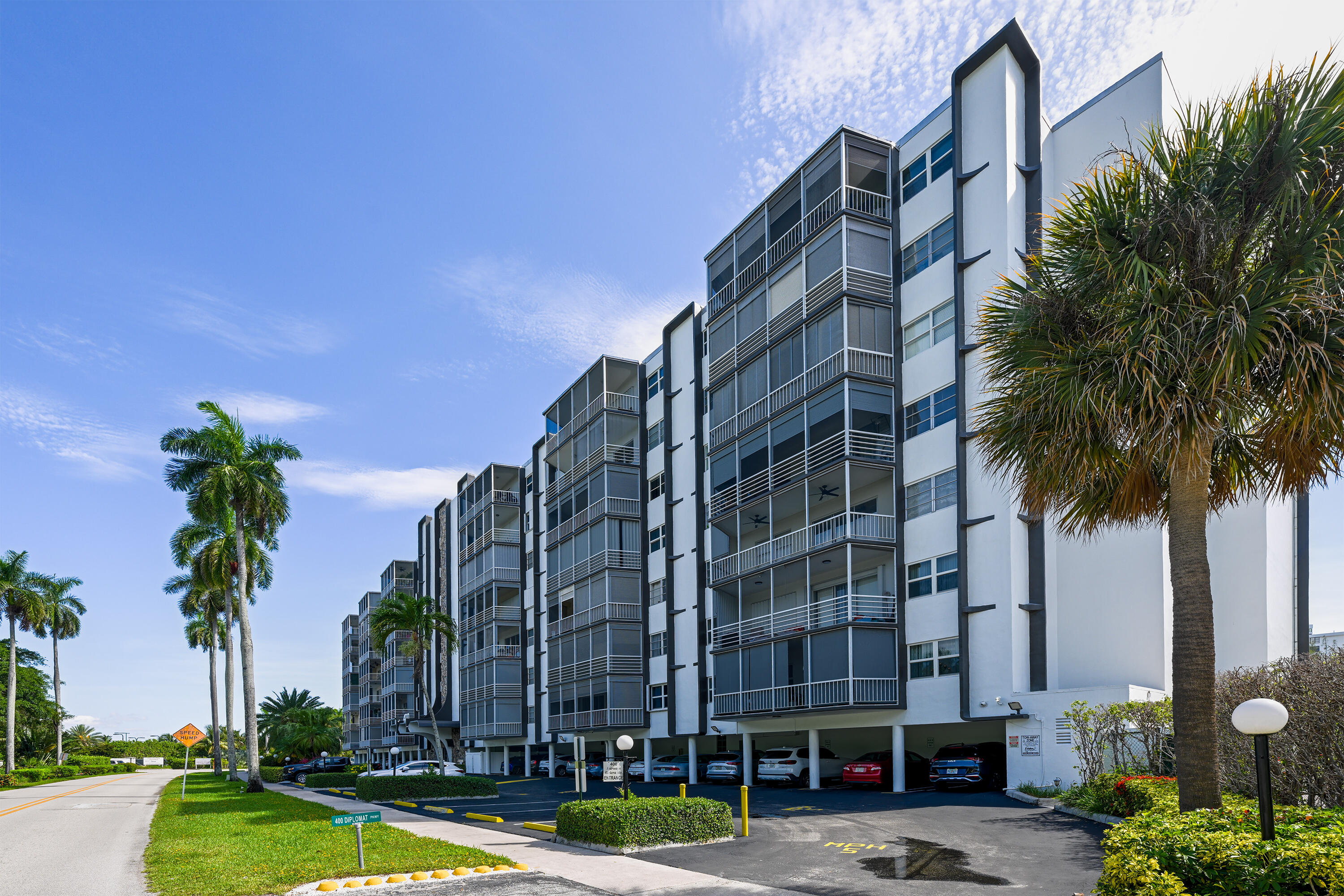 Beautiful water from the balcony with roll up shutters.  Open floor plan and split bedroom floor plan.  Walking distance to restaurants and shopping and the beautiful Hallandale Beach.  This unit needs work, but it aims to justify the upgrade that is required.  Remember--location can't be changed and this is a superior location in a well-maintained building in Hallandale Beach.  Renting is not allowed so you have owners interested in keeping up their investment.   The Gym and Game Room on the pictures are in Building 250 Diplomat Parkway -which this building's residents have the right to use.